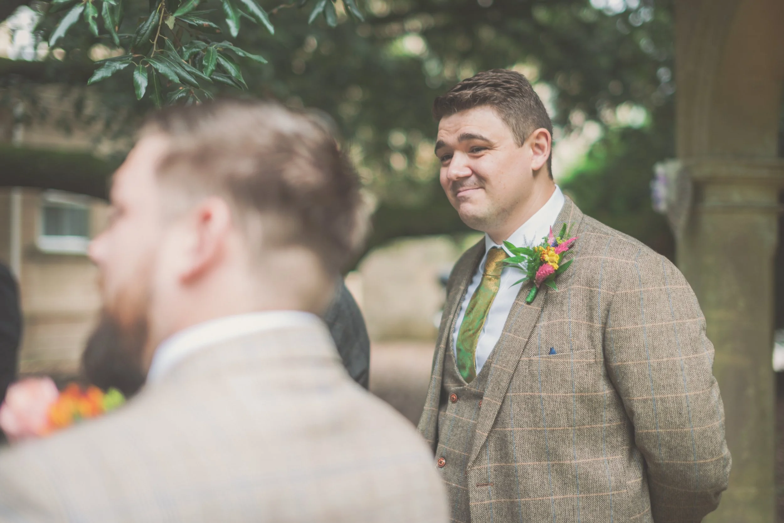 Groom waiting patiently for the bride for outdoor ceremony at Aldwick Estate