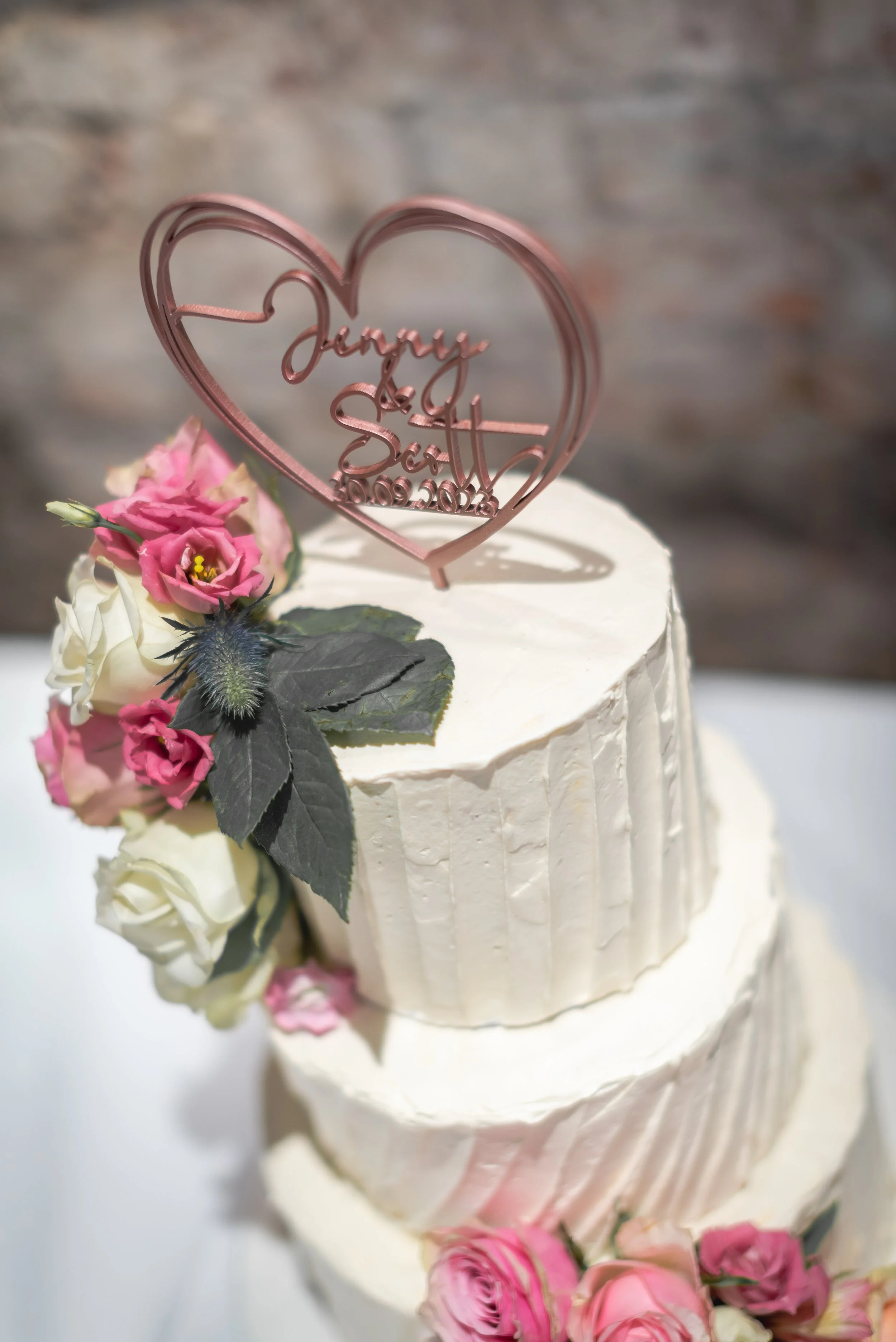 Wedding cake with floral decoration at Avon Gorge Hotel reception
