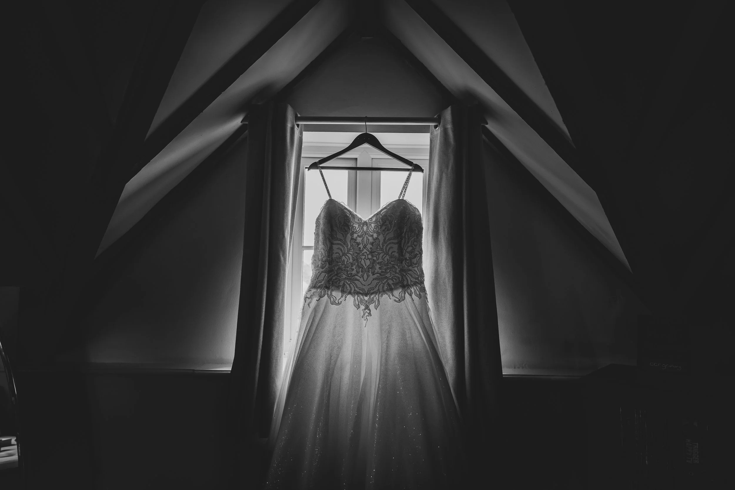 Wedding dress hung at Deer Park Hall