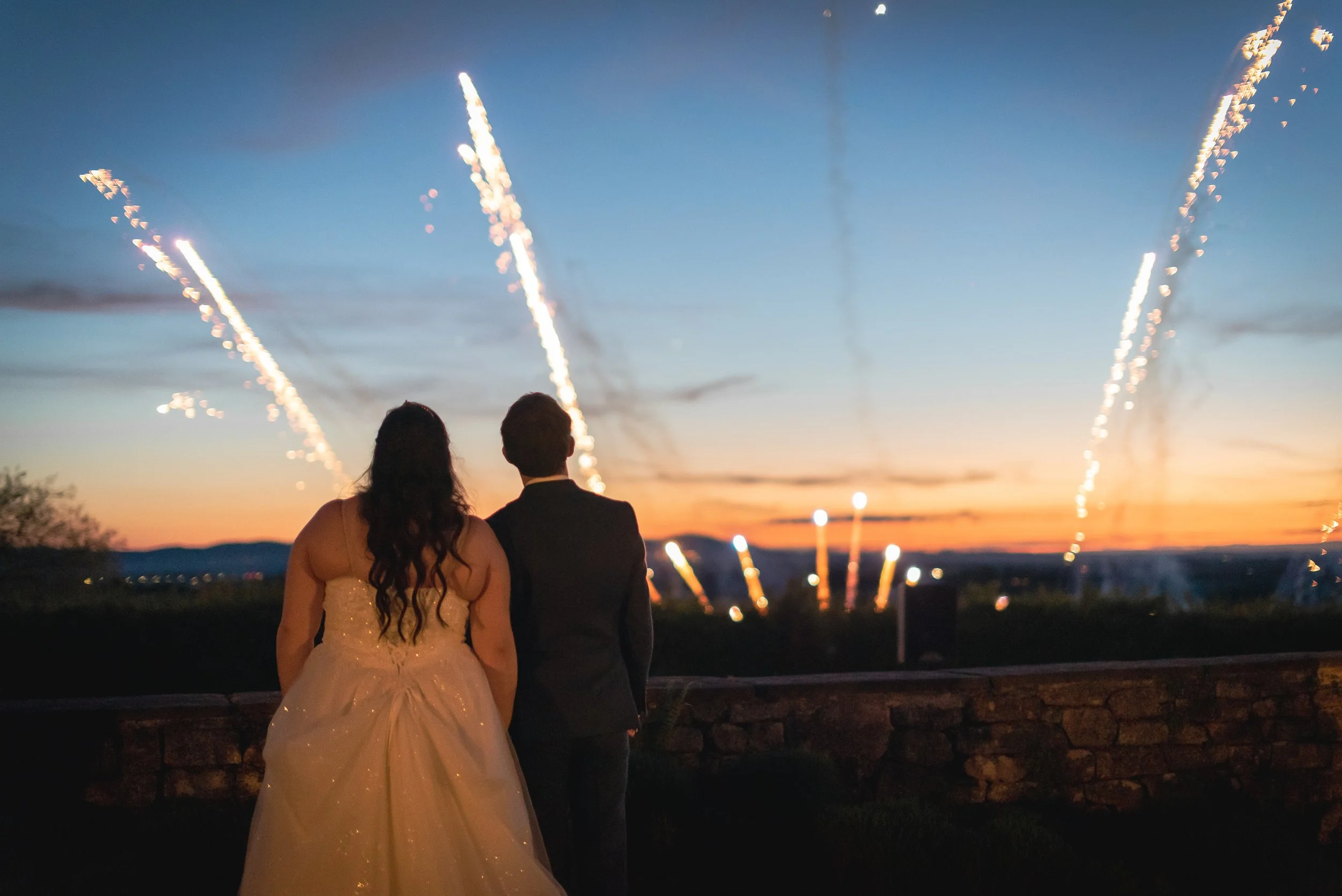Fireworks at Deer Park Hall with bride and groom watching on