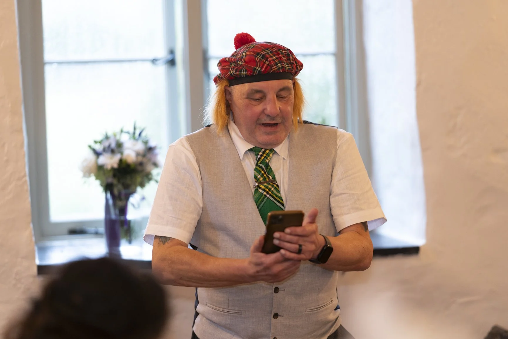 Father of the bride donning a scottish hat during his speech at Priston Mill in Bath