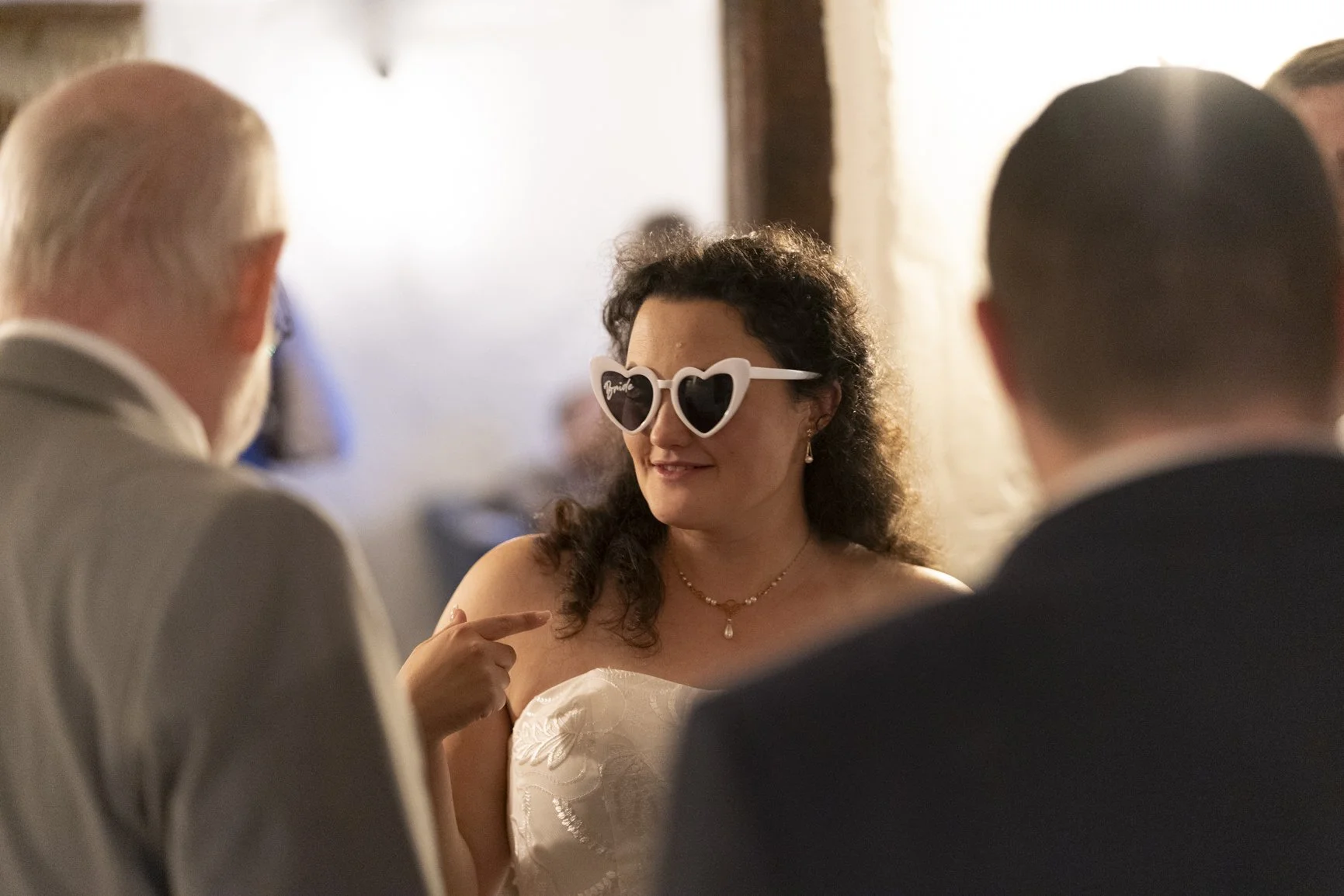 Bride wearing heart funky glasses during her wedding at Baths, Priston Mill