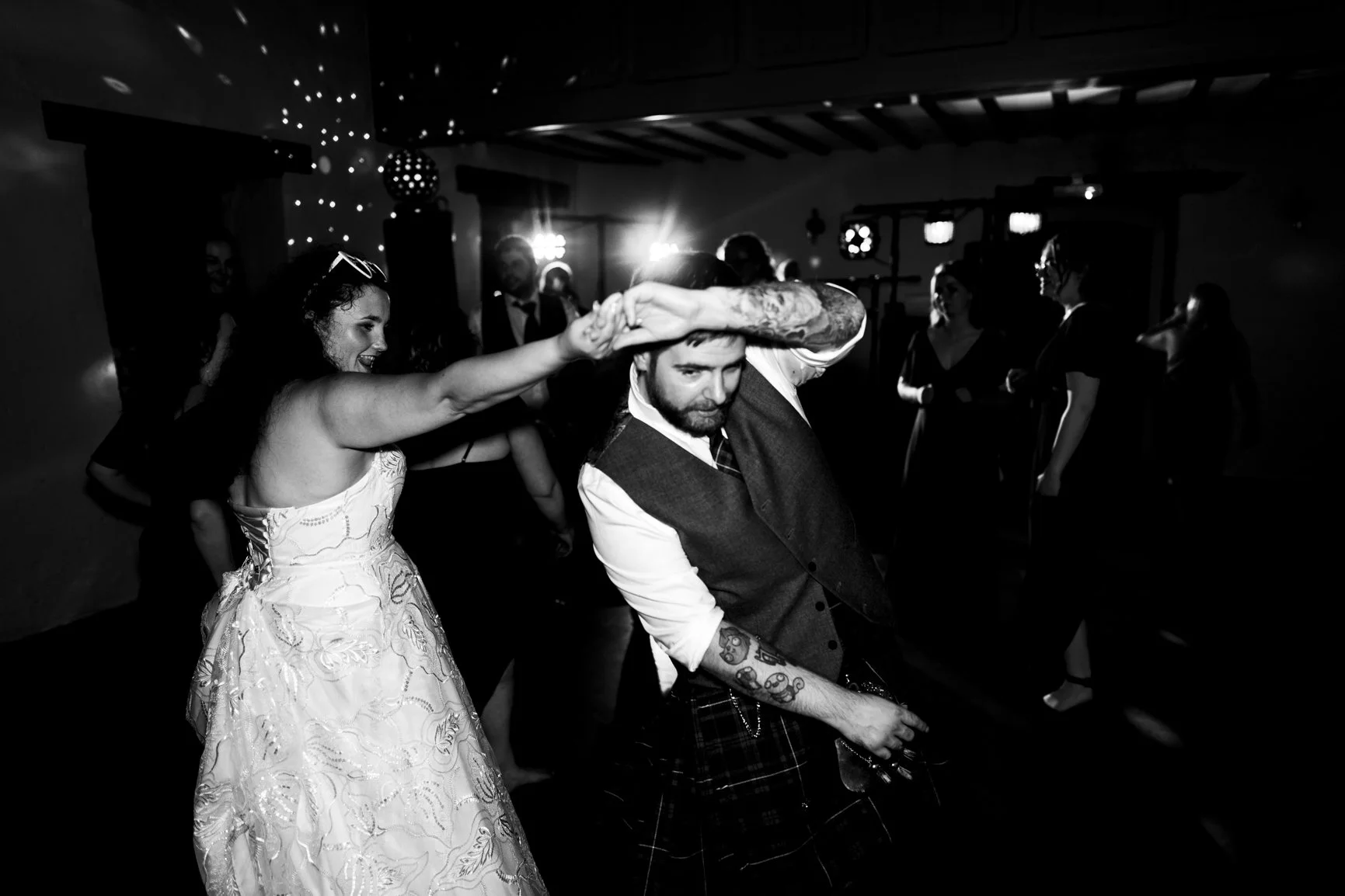 Bride and Groom dancing at Priston Mill captured by Bath Wedding Photographer
