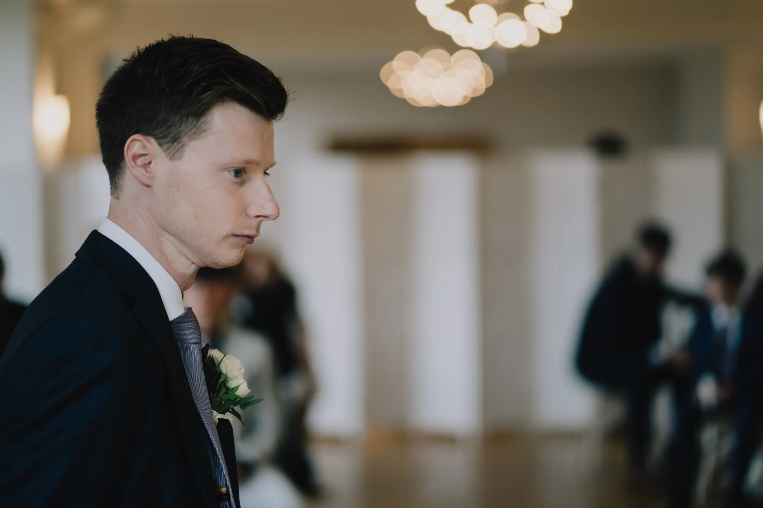Groom looking on nervously at Coombe Lodge before the ceremony