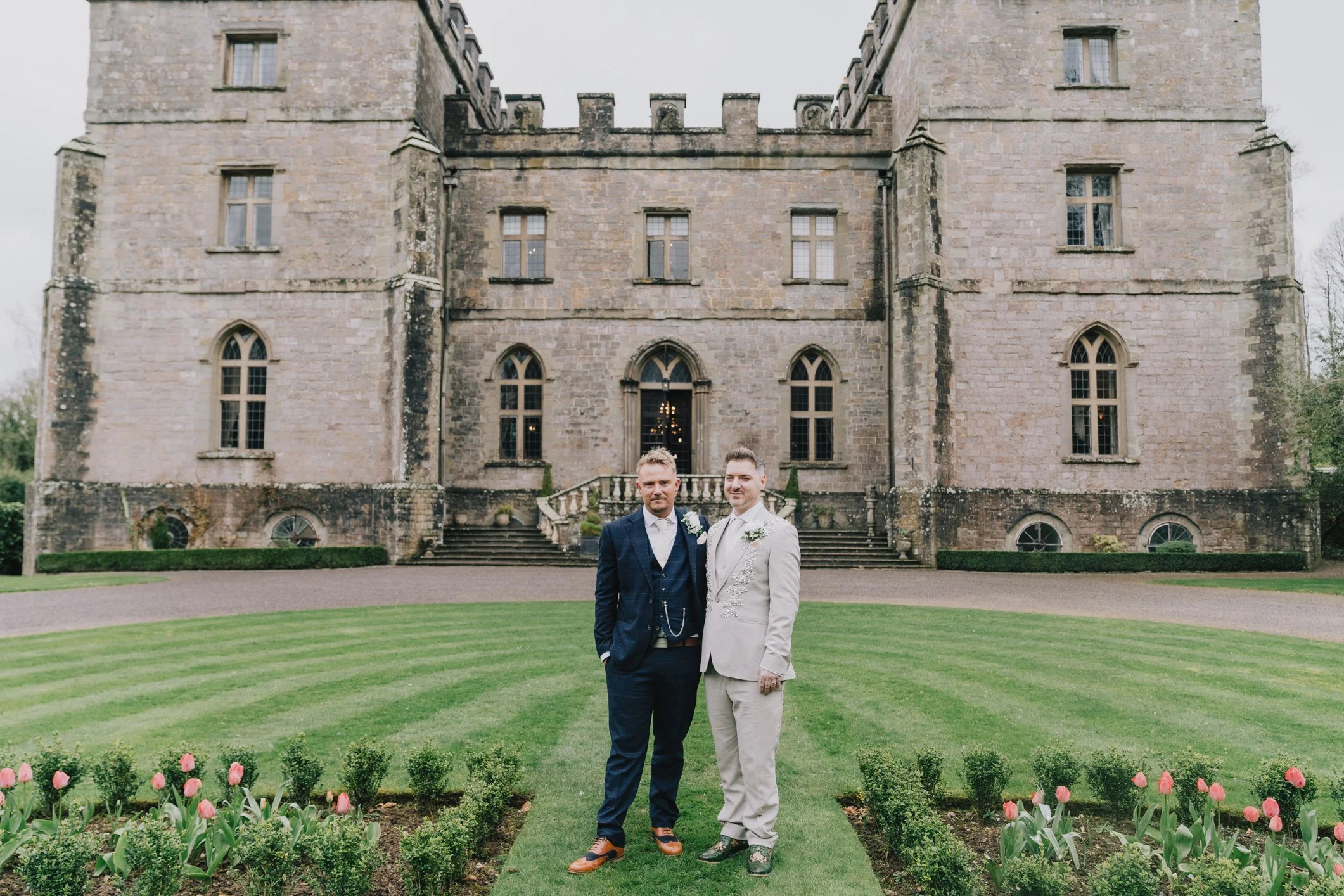 Groom stand proudly at Clearwell Castle