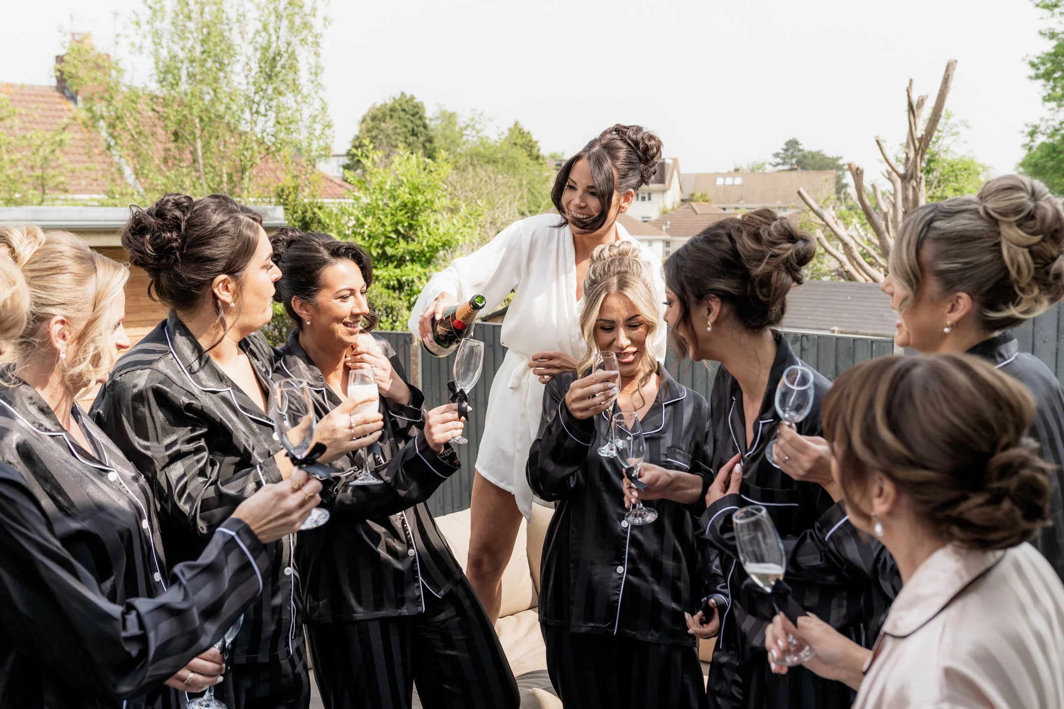 Bride dancing during her prep in Bristol