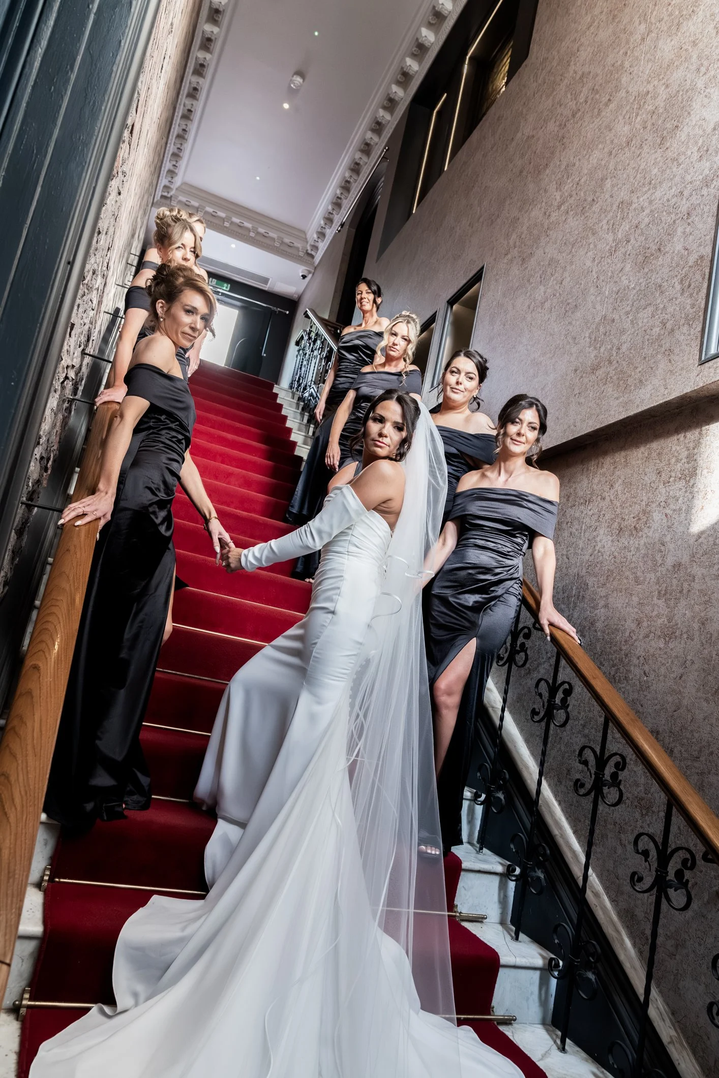 Bride and her bridesmaids on stairs at Avon Gorge Hotel