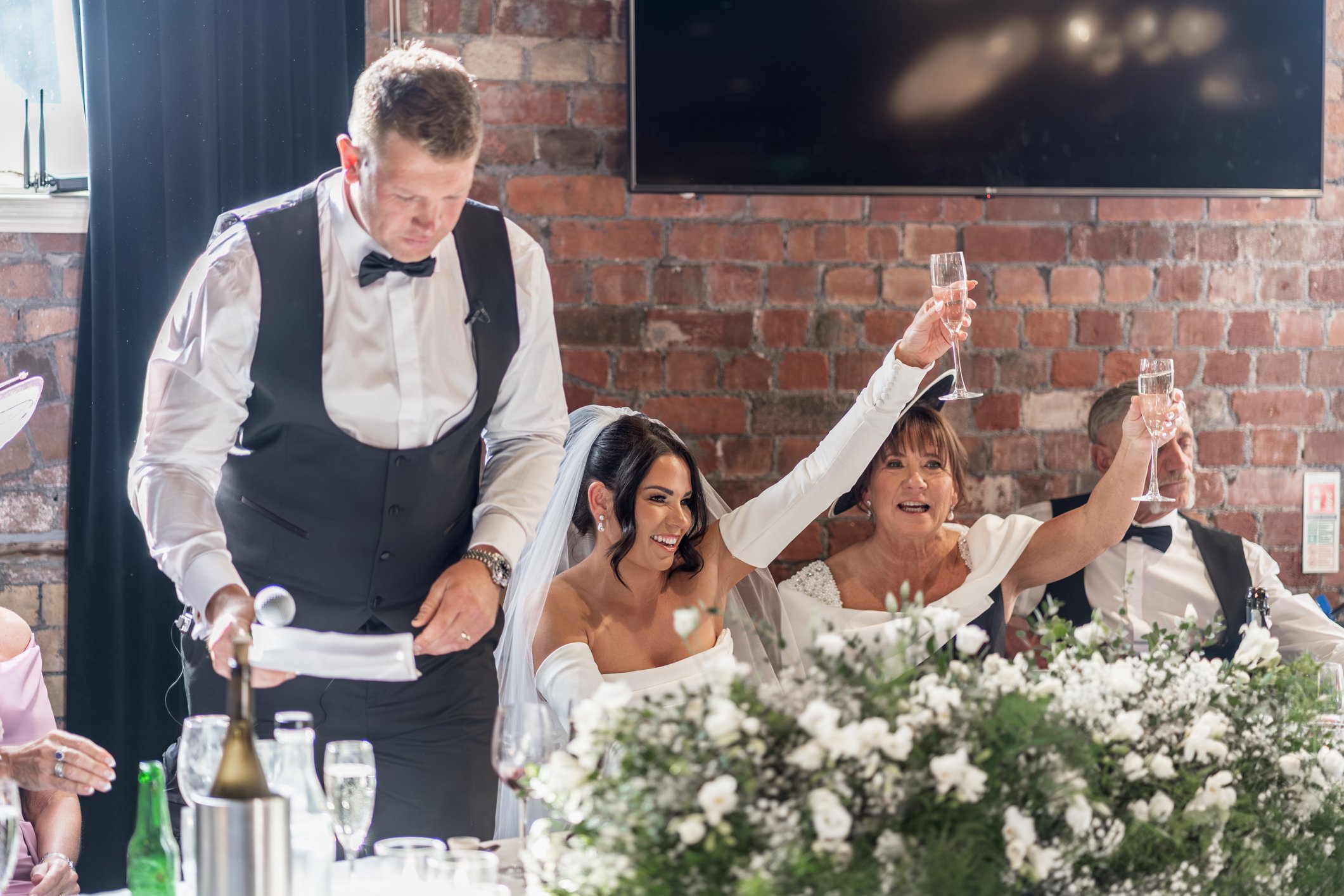 Wedding speeches at Avon Gorge Hotel with bride and mother raising glass