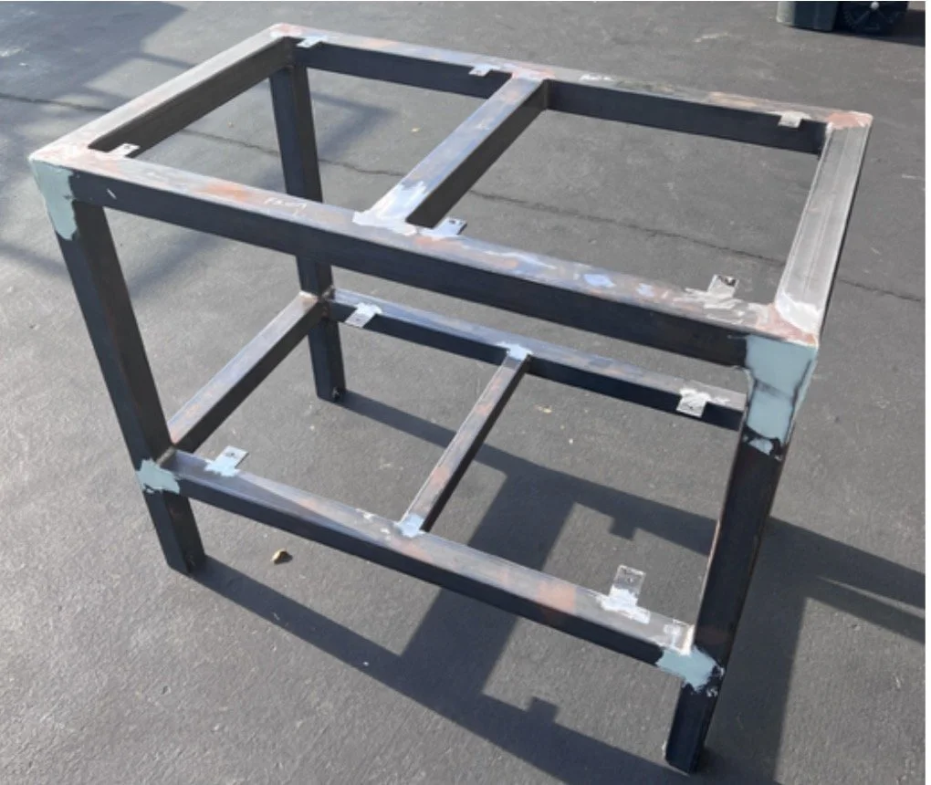 Custom tubular steel fish tank stand with storage shelf fabricated in Milford MI