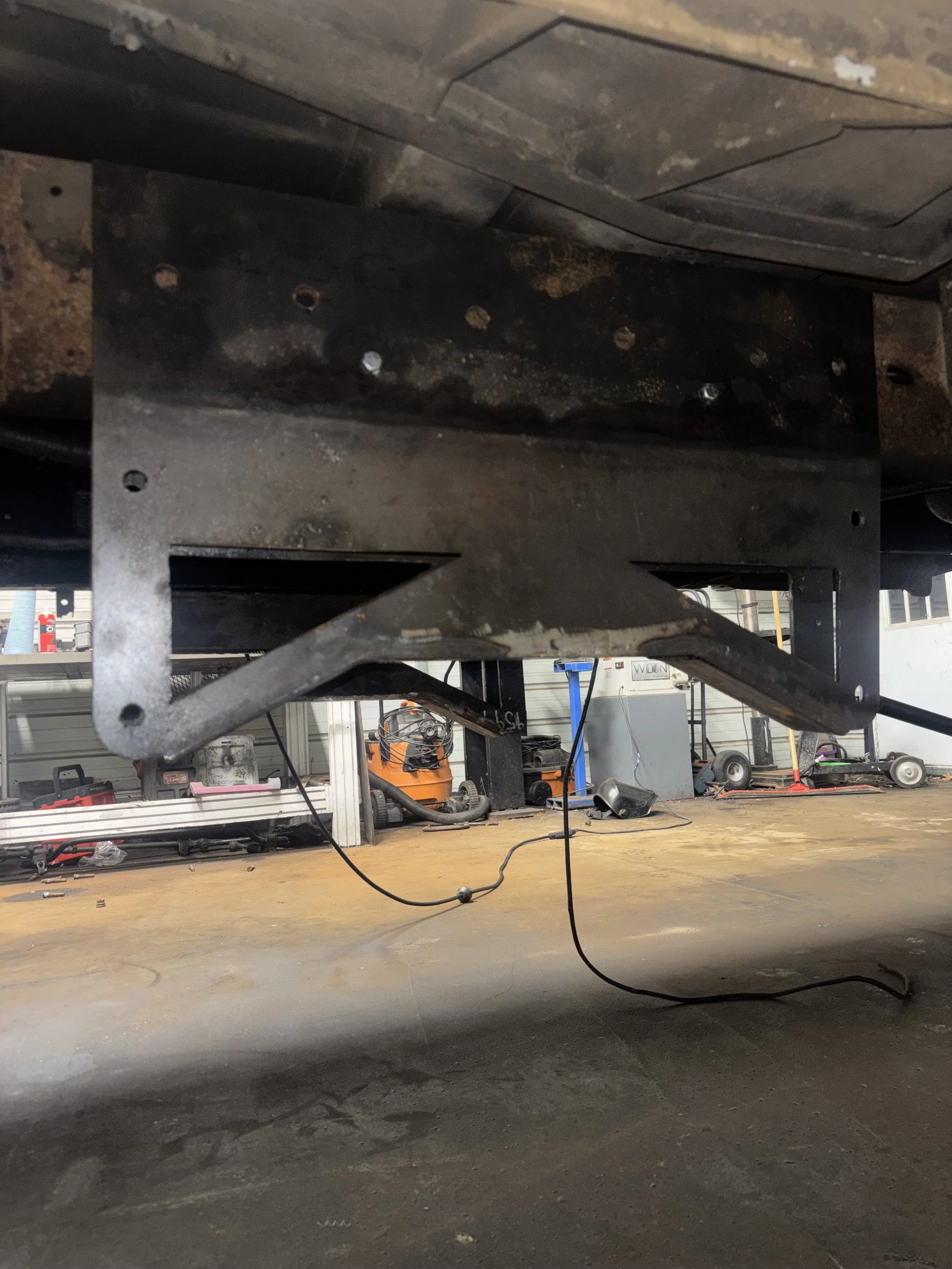 Custom 4 link suspension cradle fabrication for truck build in Oakland County