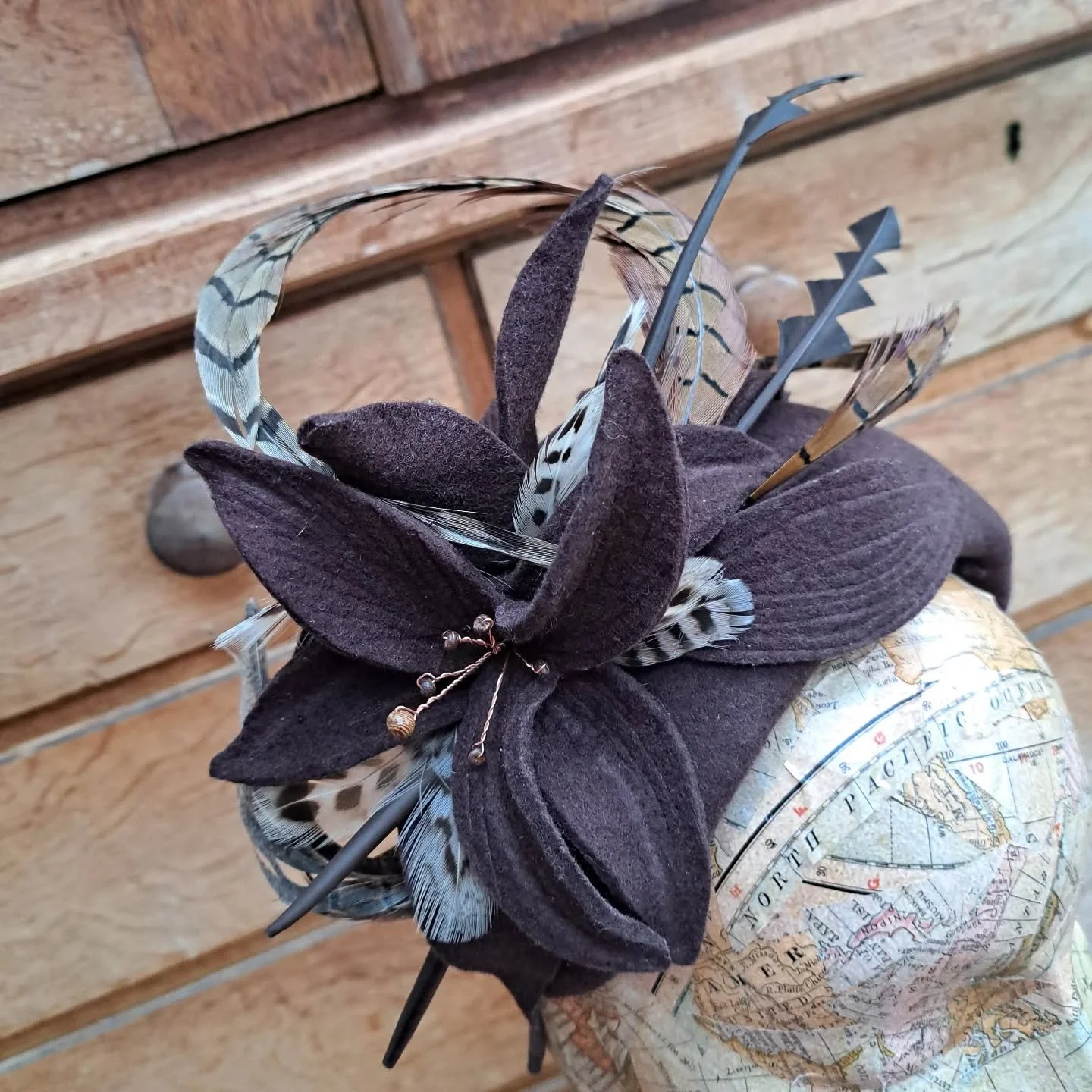 One of the bespoke pieces made for Cheltenham Festival. Brown wool headband with handmade flowers and selection of feathers! 

#midwalesmilliner 
#welshmilliner 
#bespokeheadpiecesandhats 
#cheltenhamfestival