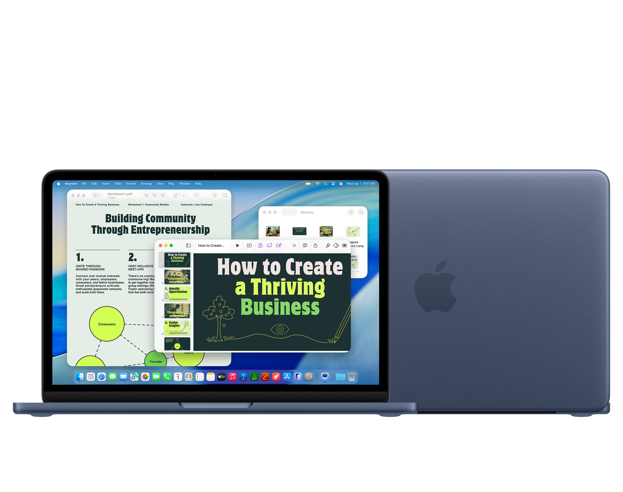 A blue Apple MacBook laptop displaying multiple digital notebooks and presentations on its screen, with a closed MacBook behind it.