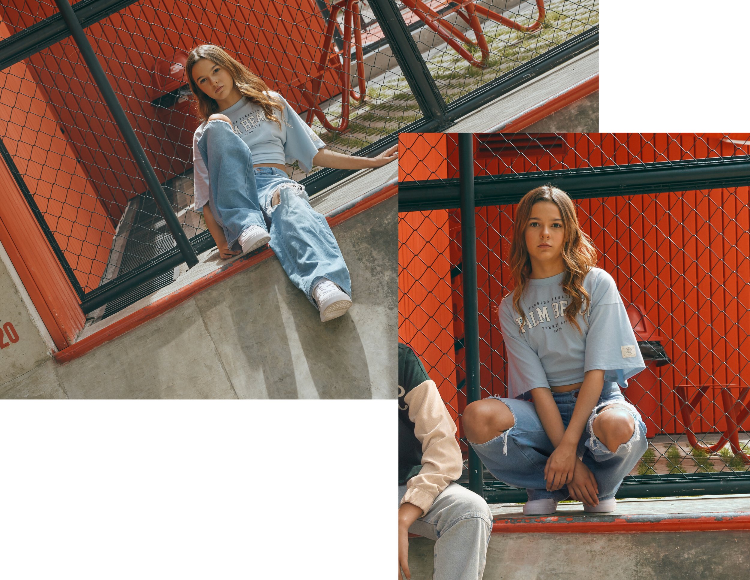 Light blue cropped T-shirt with front chest typography inspired by collegiate graphics, combining clean lettering with a relaxed silhouette and a branded sleeve label detail.