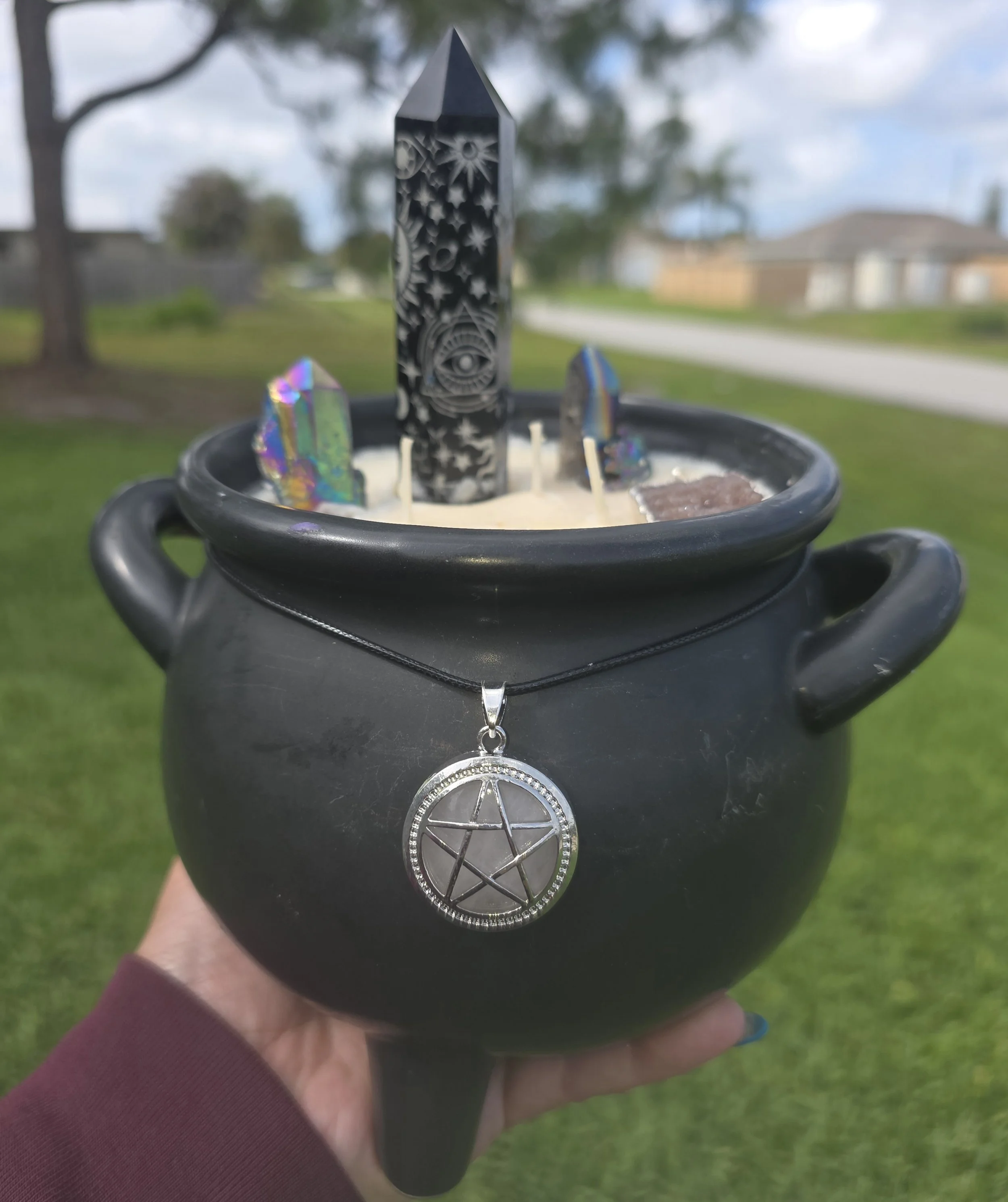 holding black cauldron.jpg