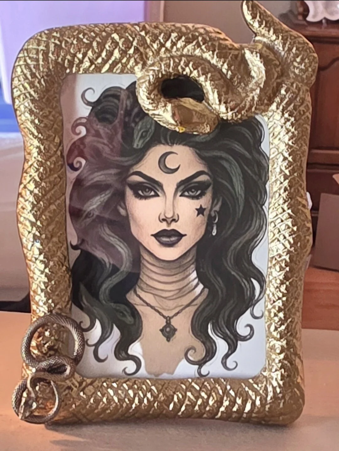 Lillith in snake frame.jpg