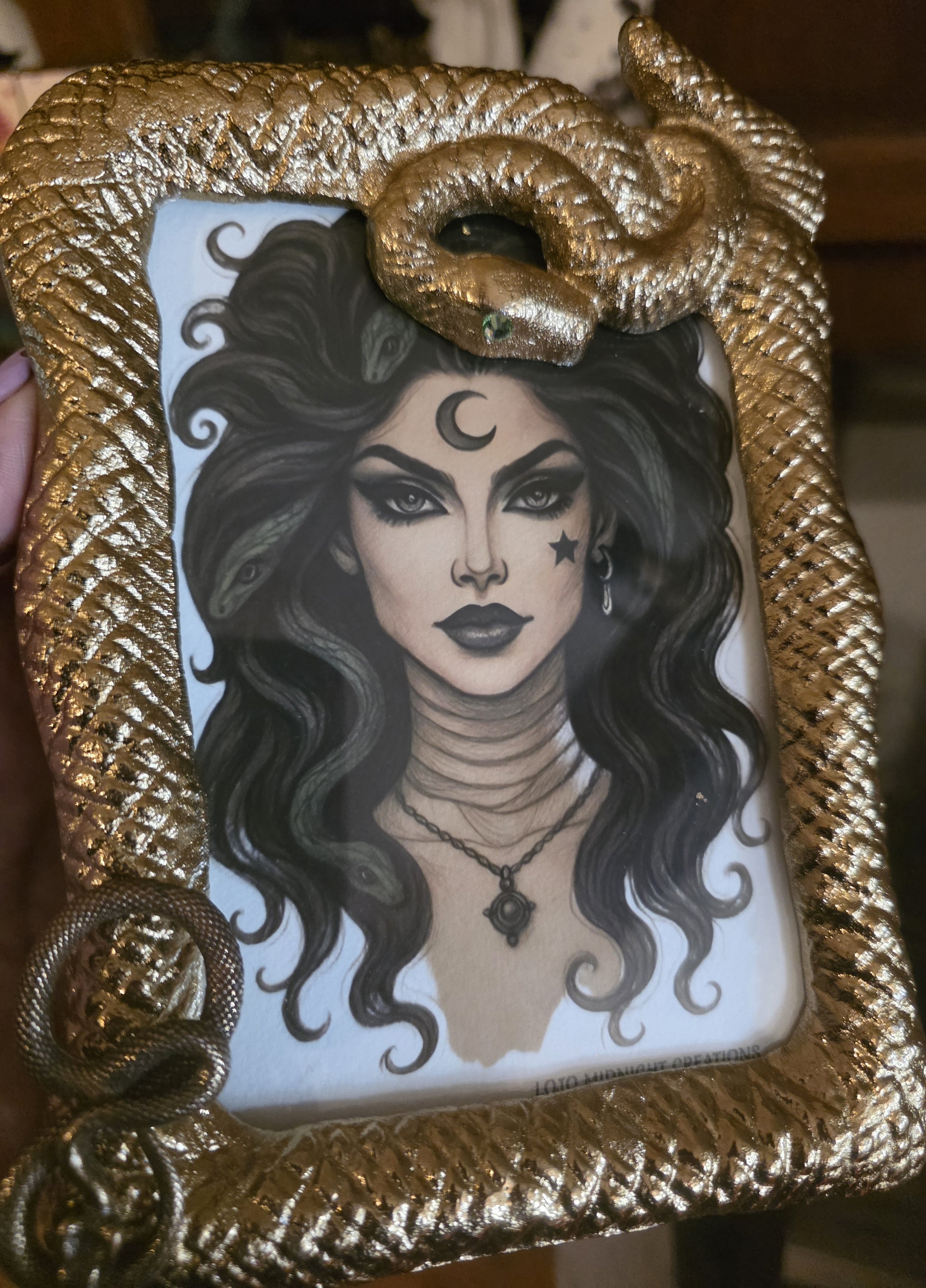 me holding full view lilith in snake frame.jpg