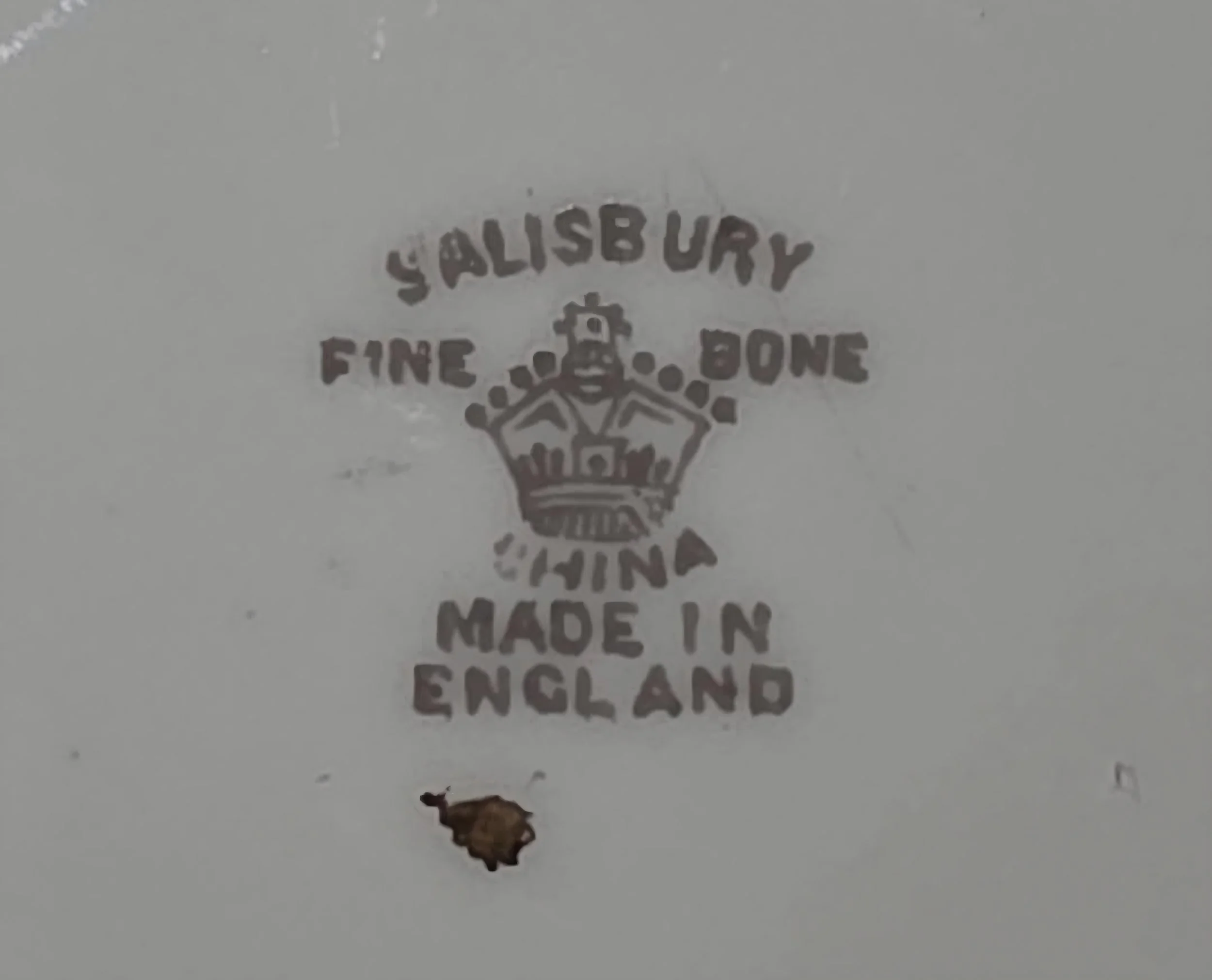 bottom of flower teacup plate.jpg