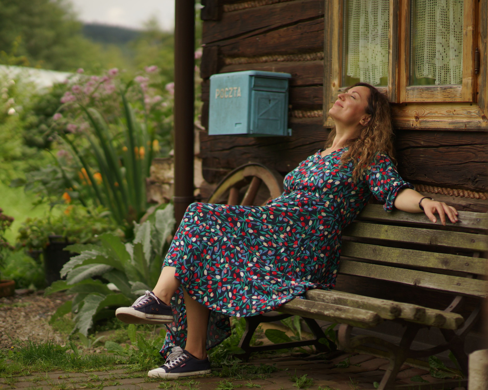 Woman in garden enjoying outdoors