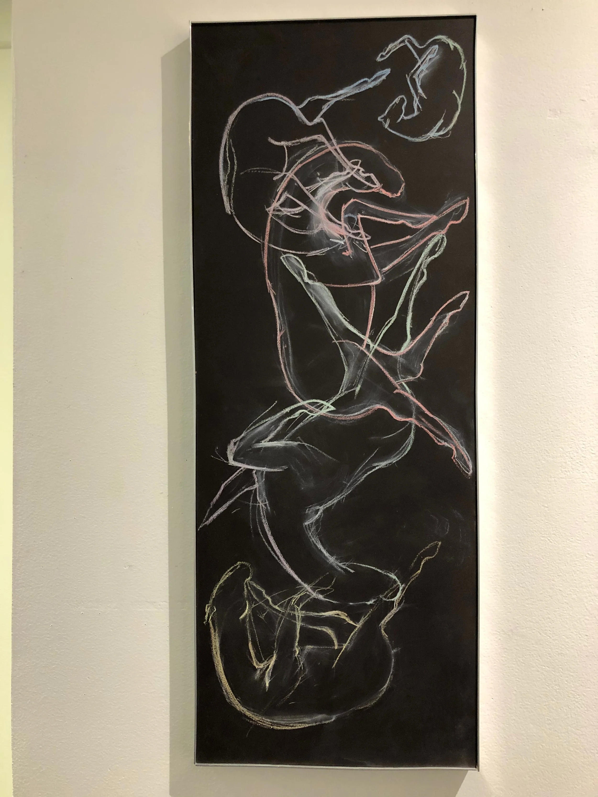 Abstract chalk drawing of a human figure in various poses, animated and dynamic, on a black background.