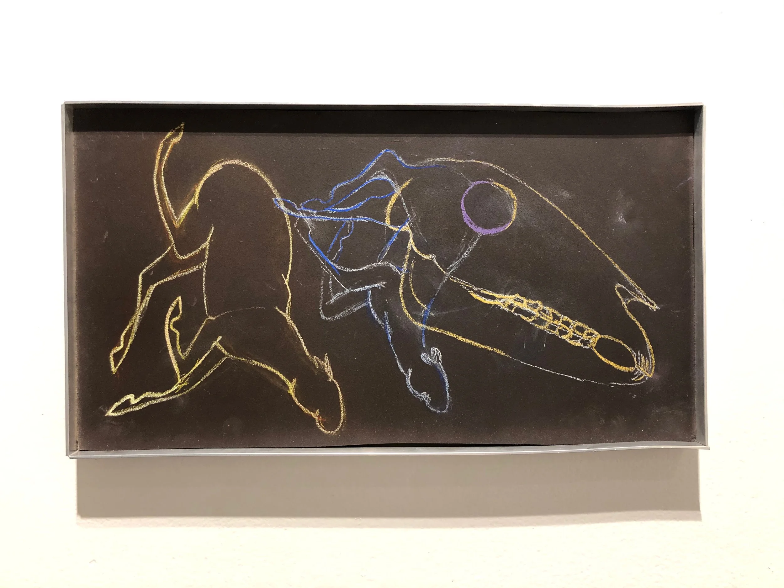 Colorful chalk drawing of a beetle and a praying mantis on a black background.