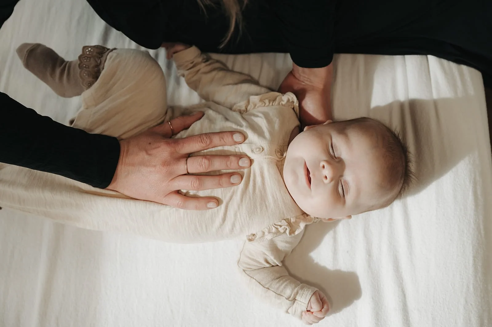 Newborn experiencing osteopathic care at holm collective, lacombe AB