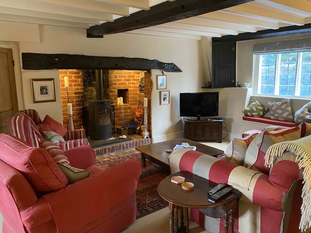The main living room with Inglenook fireplace