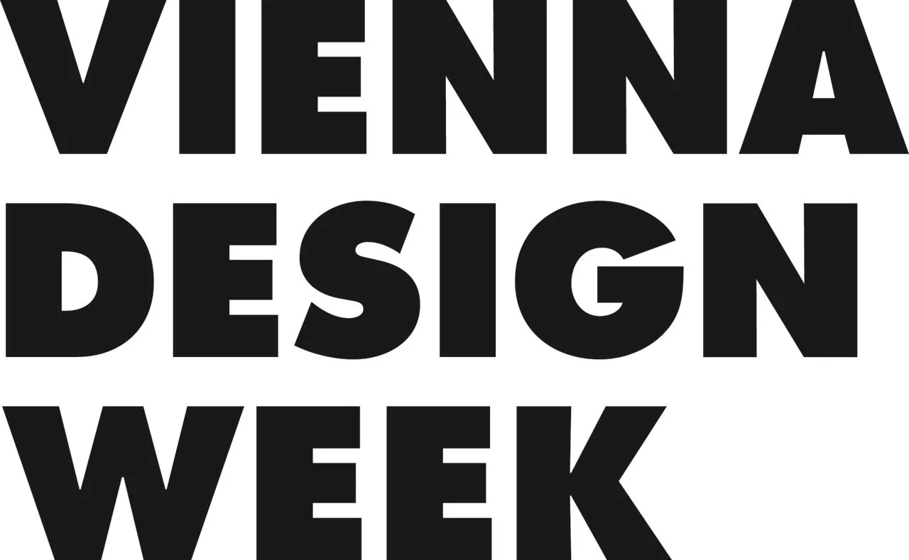 Textzusammenstellung mit den Worten ‚VIENNA DESIGN WEEK‘ in großen schwarzen Buchstaben auf weißem Hintergrund.