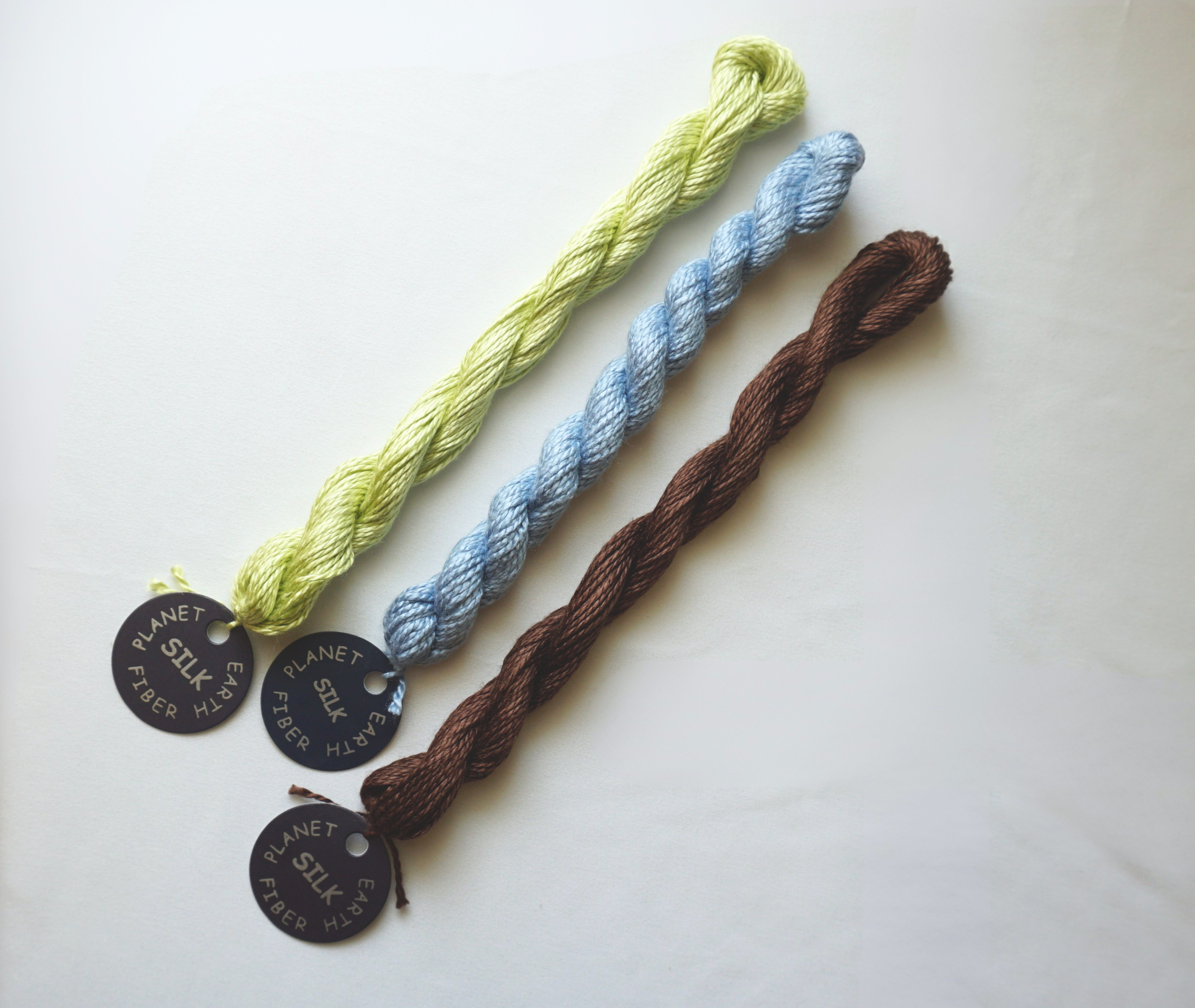 Planet Earth Silk: 13 Mesh, 30 yard skeins & 10 yard cards | Our favorite 100% silk fiber for 13 mesh comes in over 200 colors, with select colors available on cards.