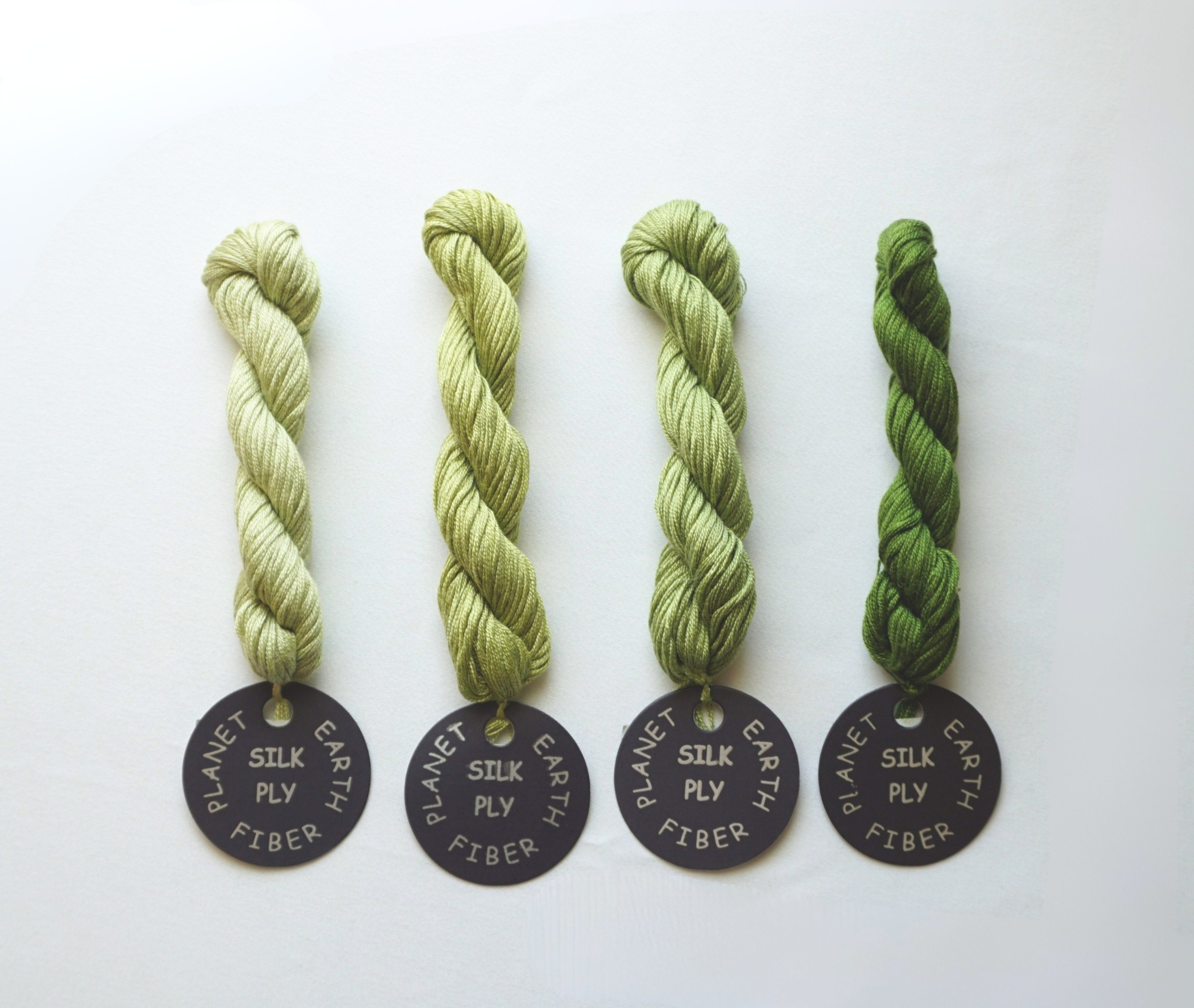 Planet Earth Ply Sik: 18 & 13 Mesh, 14 yard skeins | The same 100% silk of traditional Planet Earth Silk in an 8-ply thread. Use 4 ply for 18 mesh and 6-8 ply on 13 mesh.