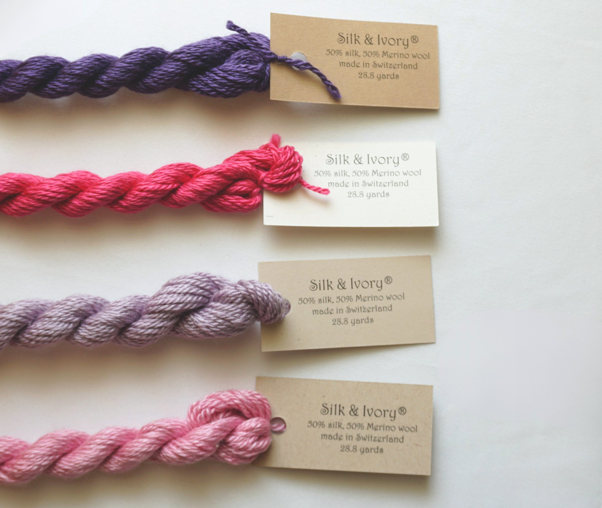 Silk and Ivory: 13 Mesh, 30 yard skeins | Another well-loved classic and 50% silk / 50% Merino wool fiber available in 250 different colors.