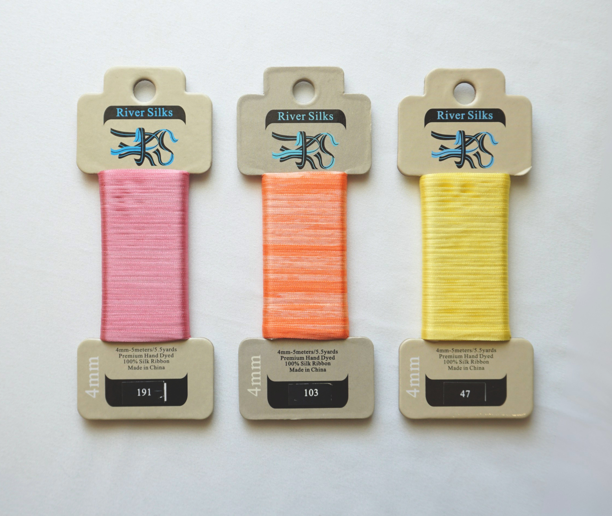 River Silks: 4mm & 7mm, 5.5 yards | Hand-dyed 100% silk ribbon available in varying widths and a rainbow of different colors. Adds a delicate touch to your florals and French knots.