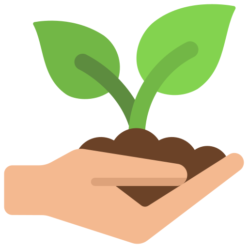 A hand holding soil with a small green plant growing from it.
