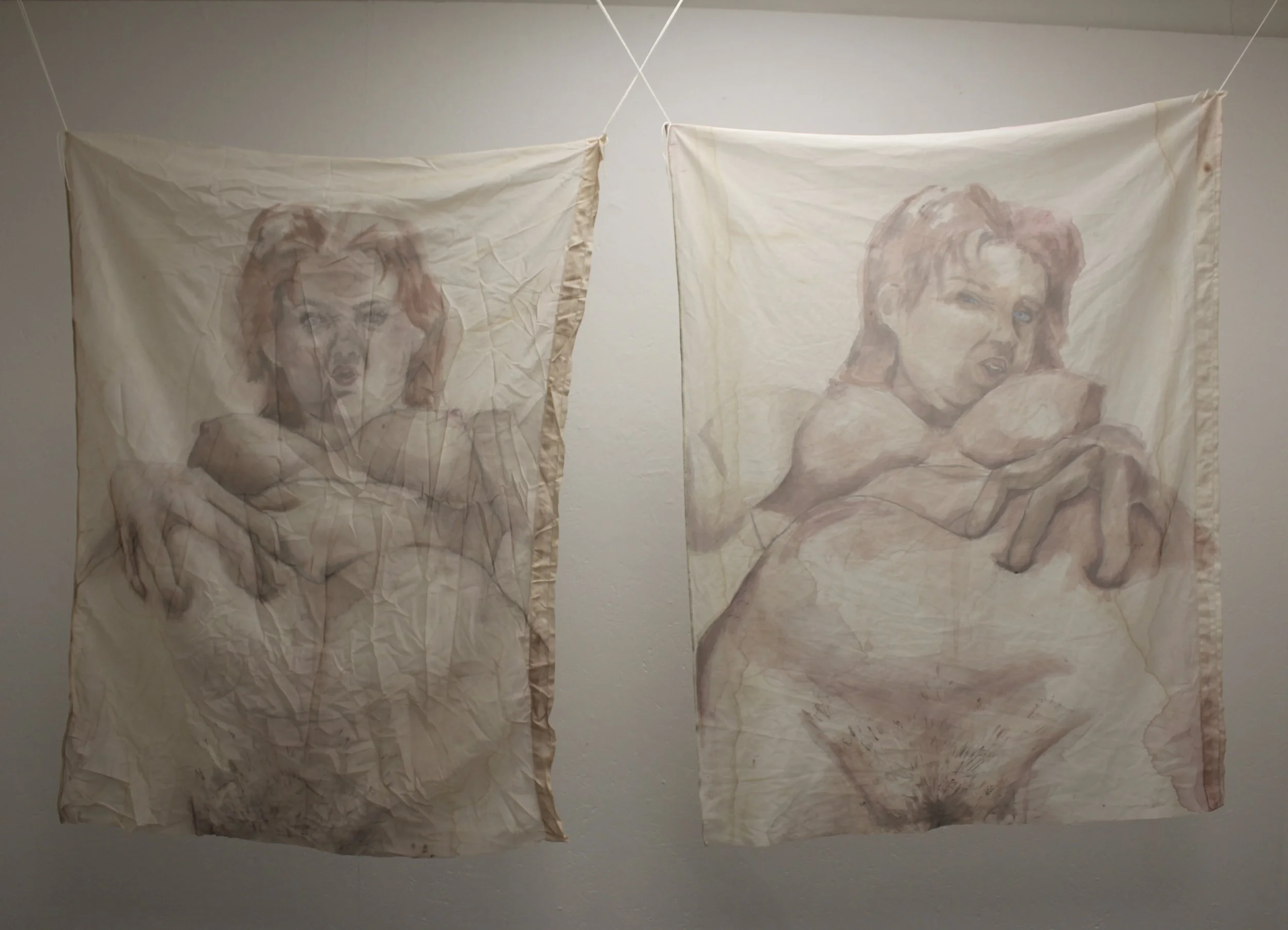 fleshy diptych painting depicting the body. figure is grabbing her stomach, glaring down at audience. on sheer material