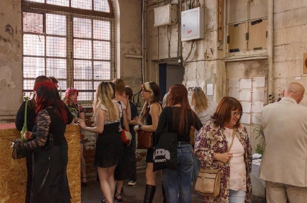 group of visitors to the Unfold exhibition
