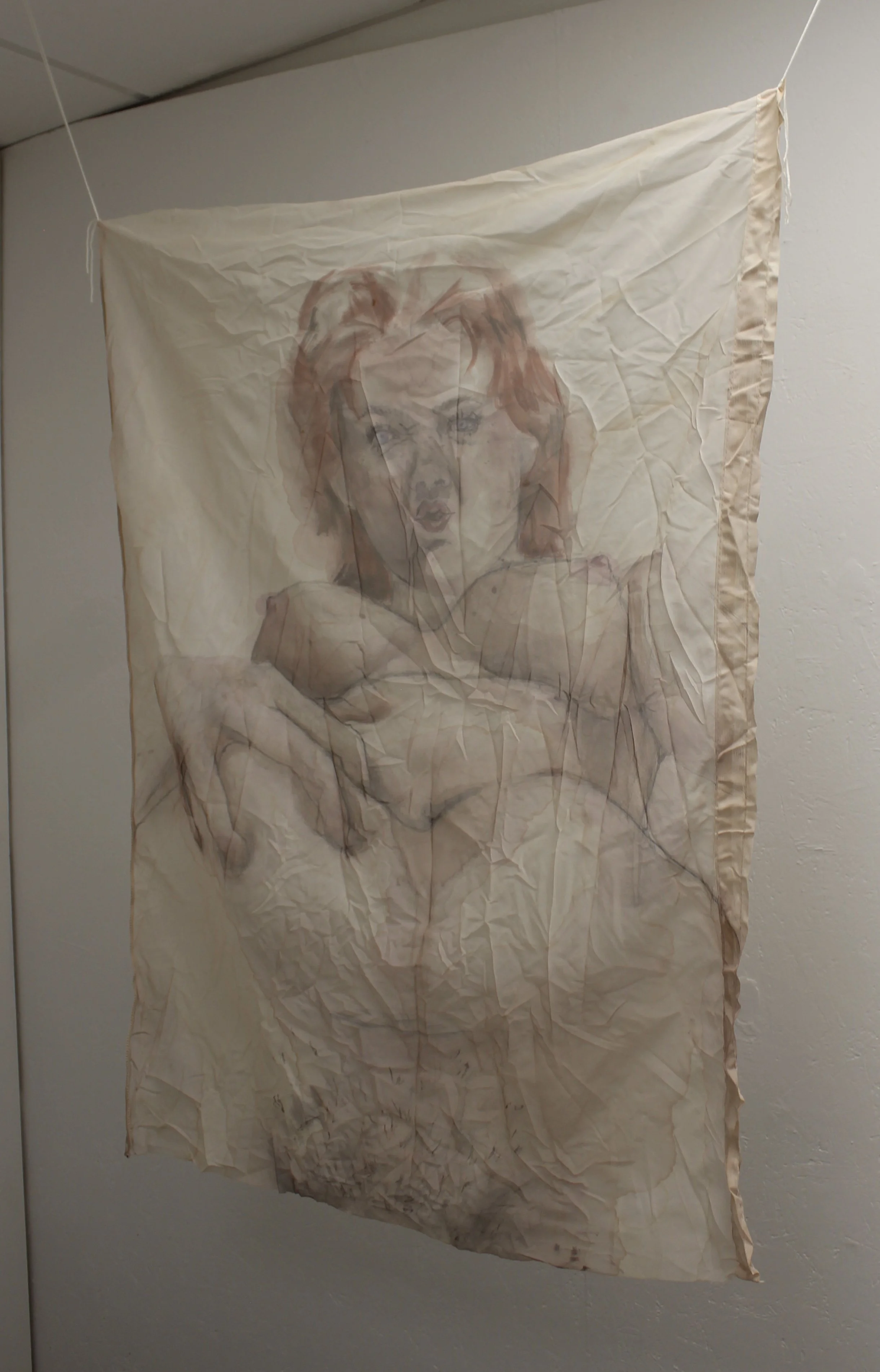 picture of left painting of the diptych, she holds her belly on the left side (viewers left), head straight on.