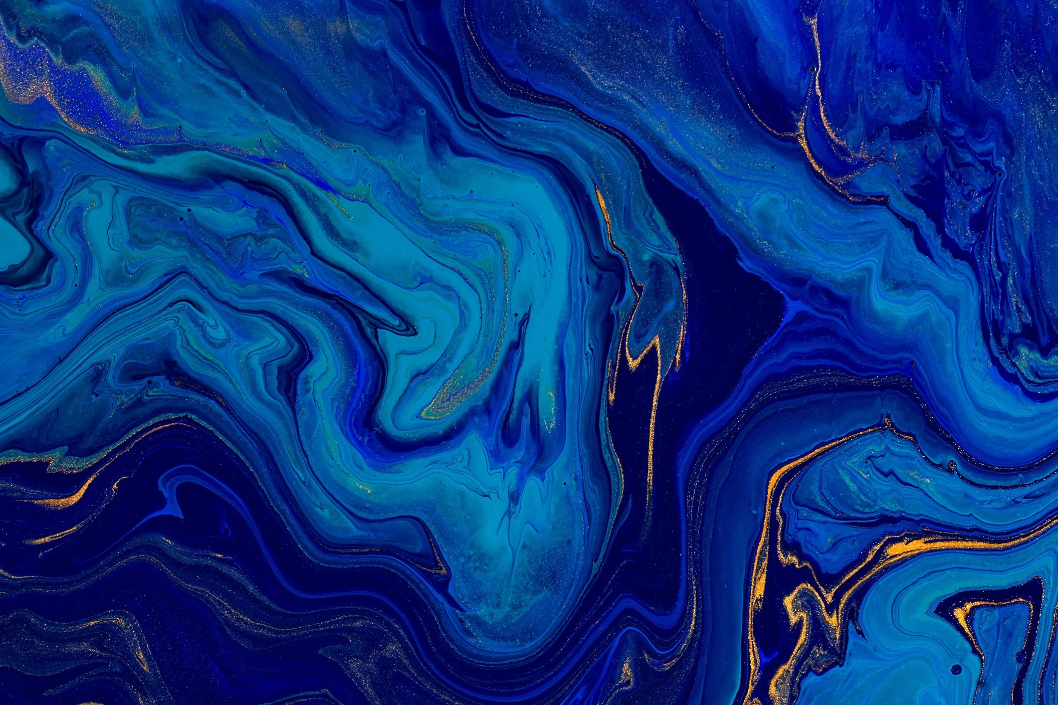 Abstract painting with swirling shades of blue and gold accents.