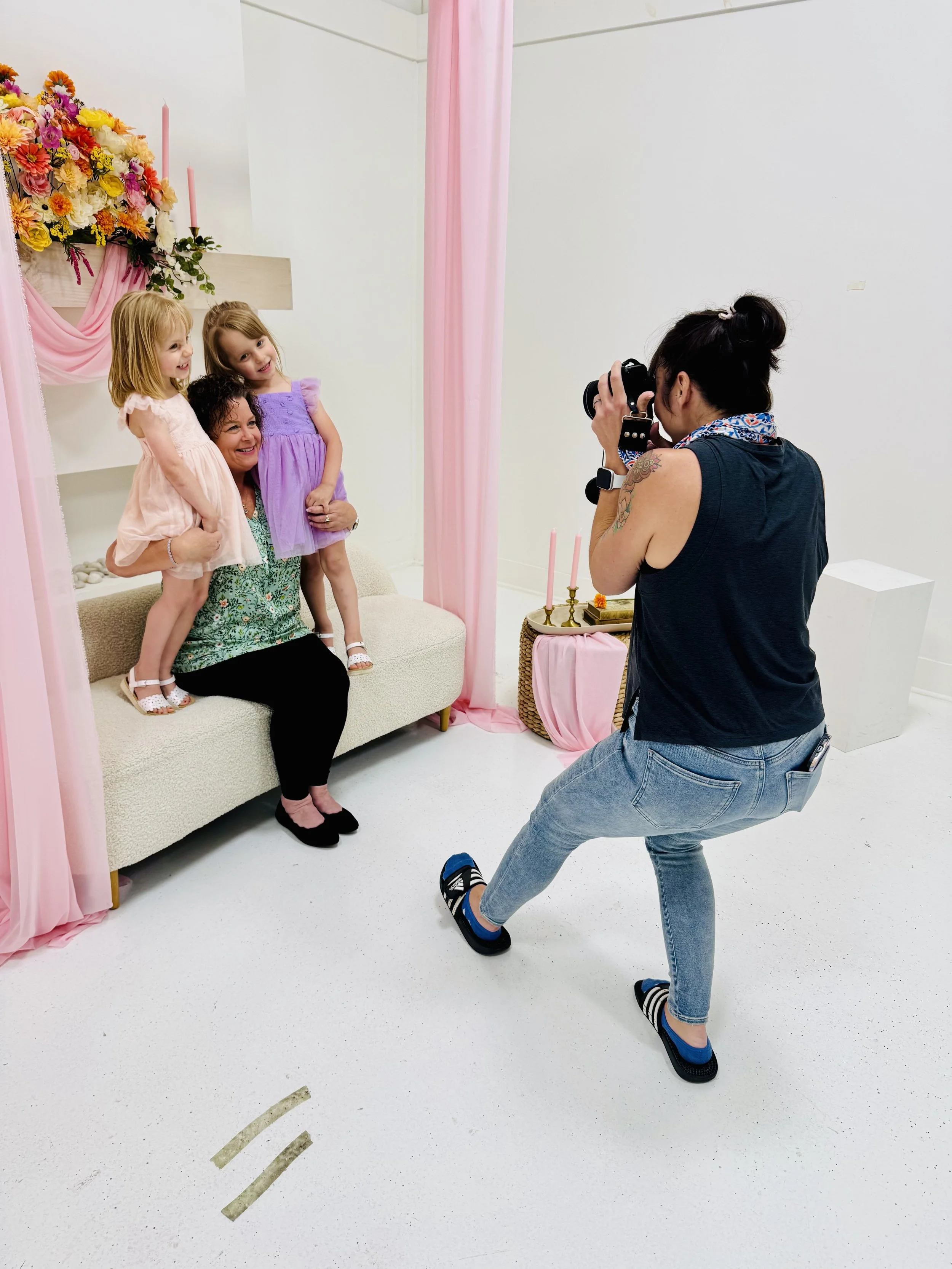 An image of Yvonne Taylor-Jones, creator of Yaya Jones Photography, during a shoot with clients.