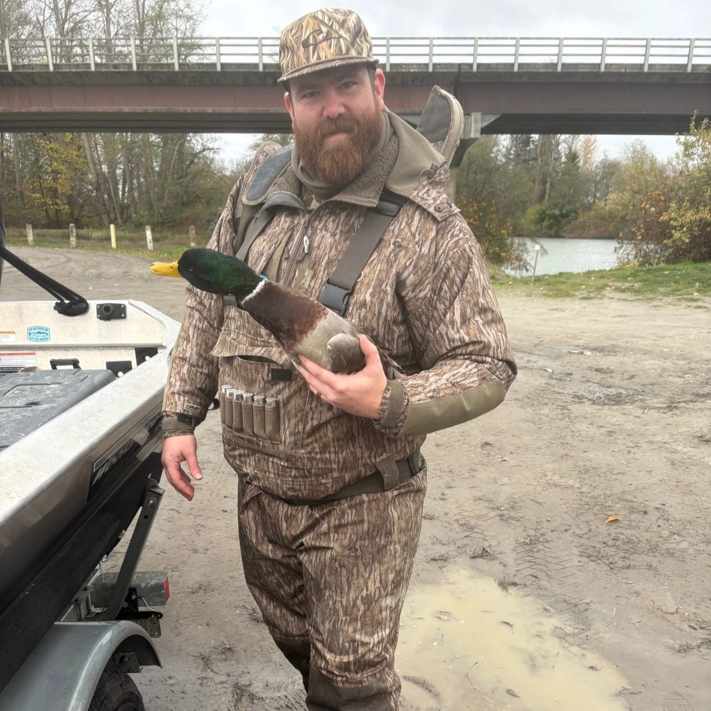 His first ever duck on a duck hunting trip off the Skagit River.