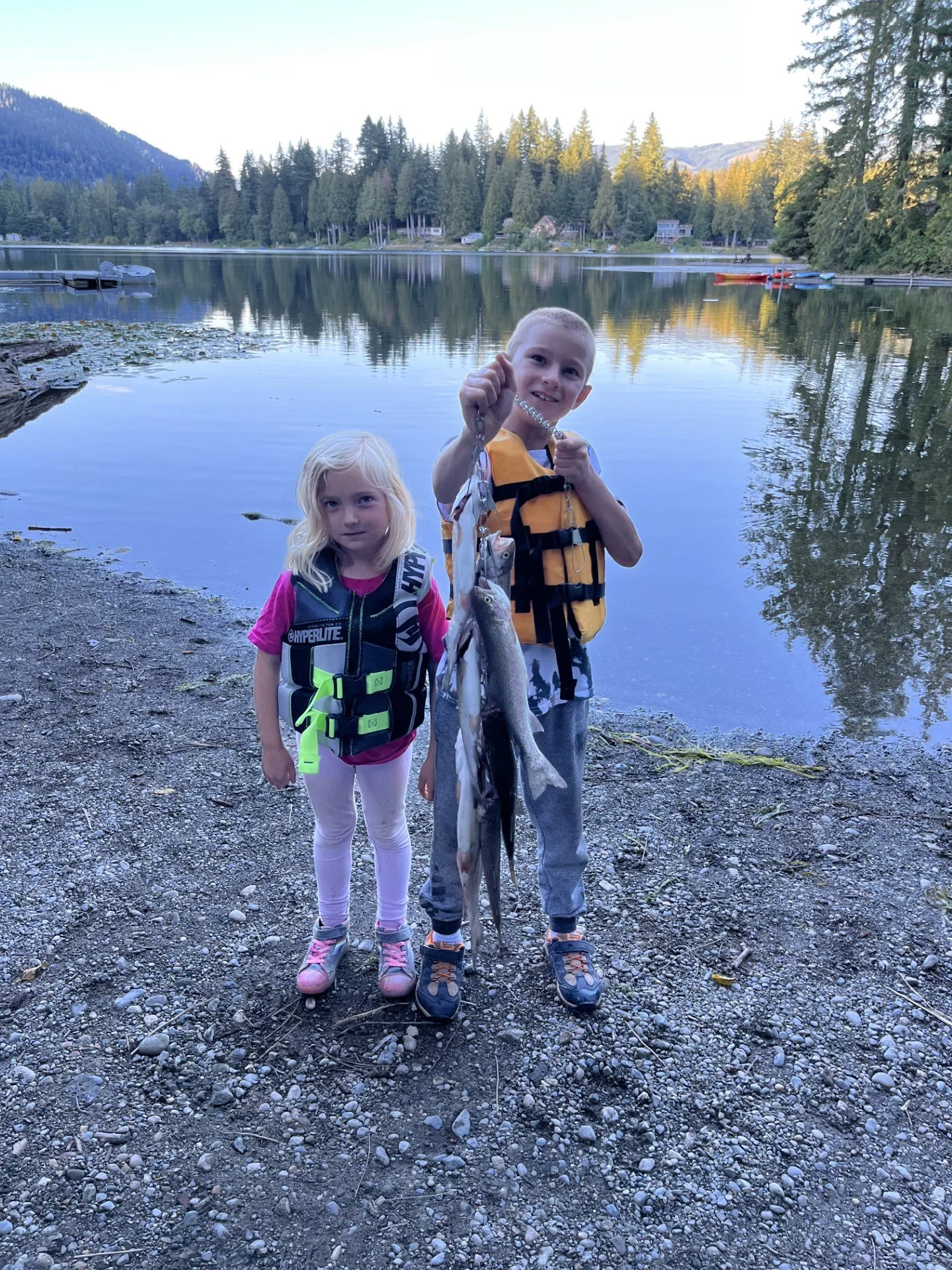 My children showing off the trout they caught from Cain Lake.