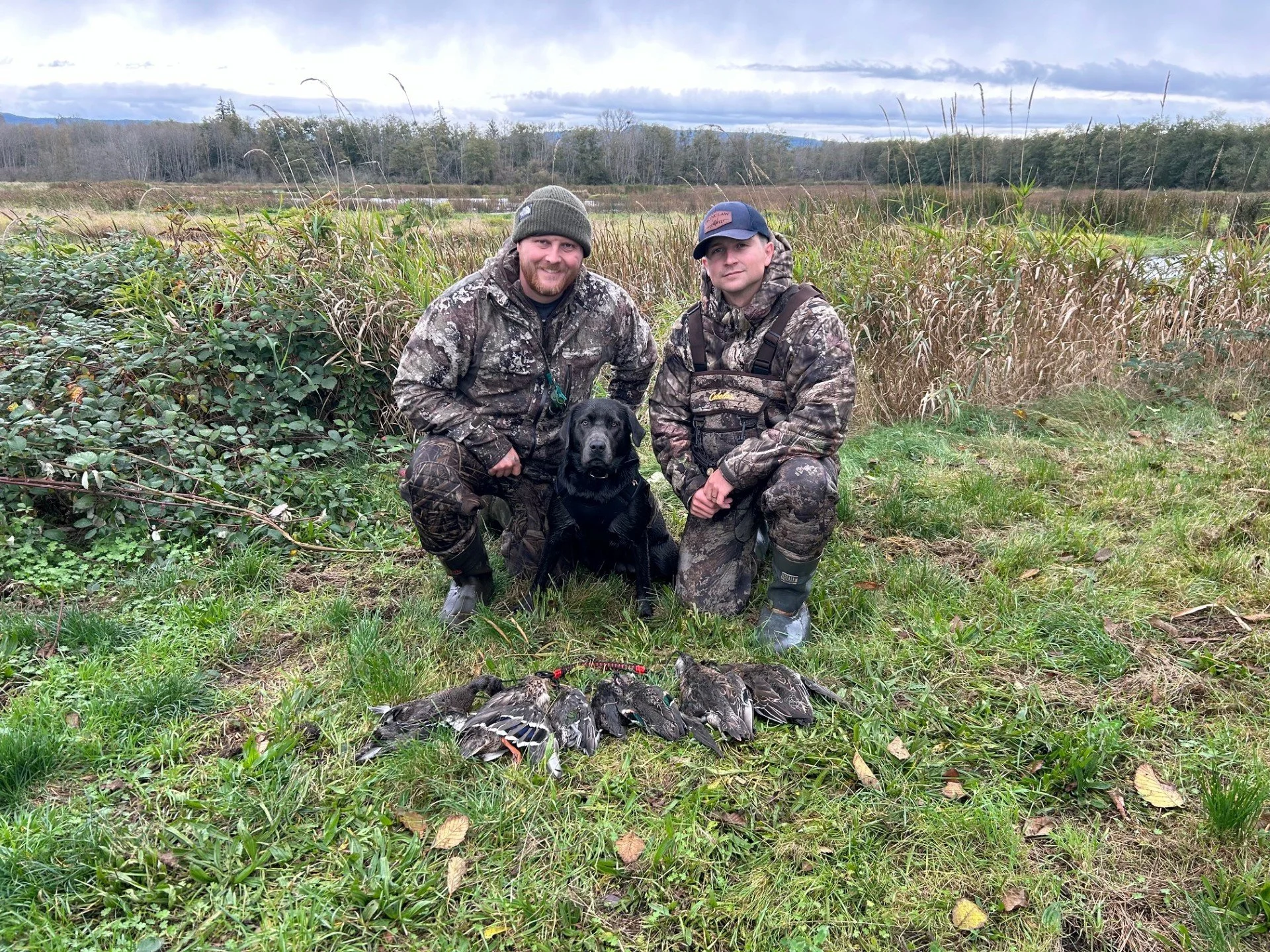 Two buddies taken out to the Skagit Marsh after a morning of duck hunting.