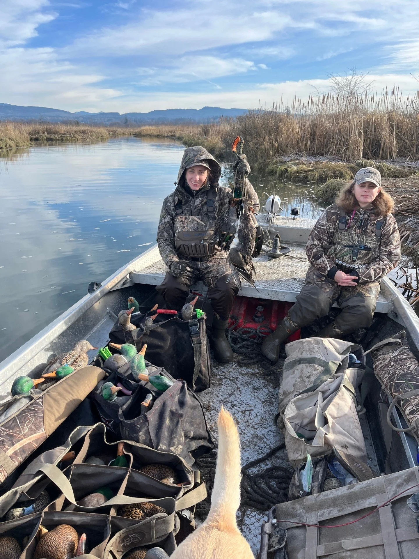 Taking two women out for a duck hunt in the lower marshes of Skagit Bay.