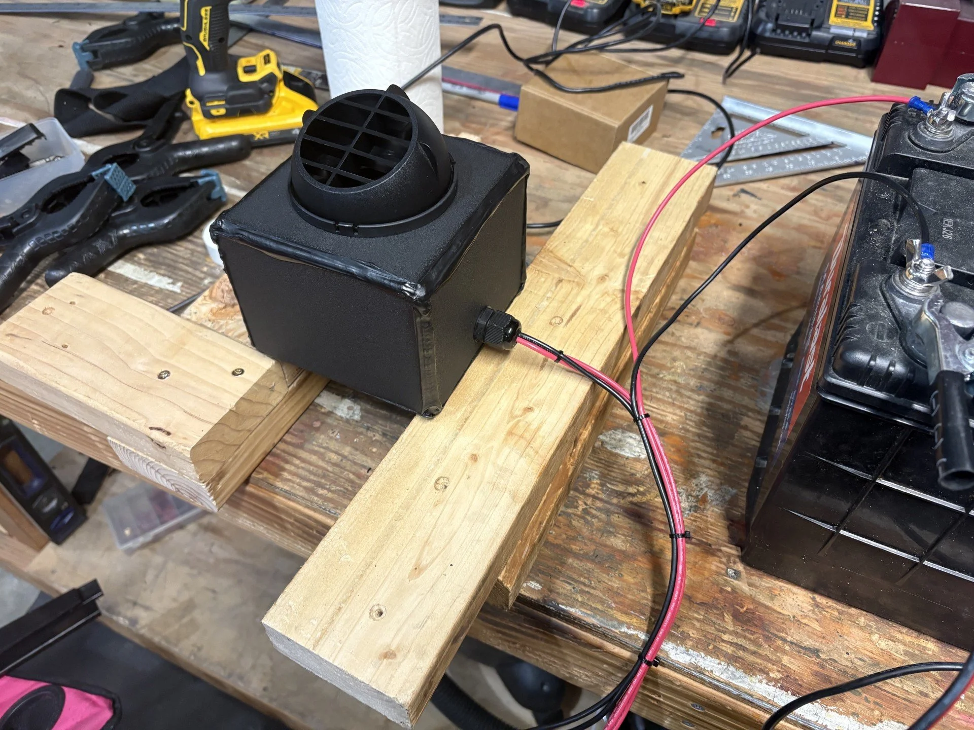 A small 12V defroster to go in a boat dash or overhead.