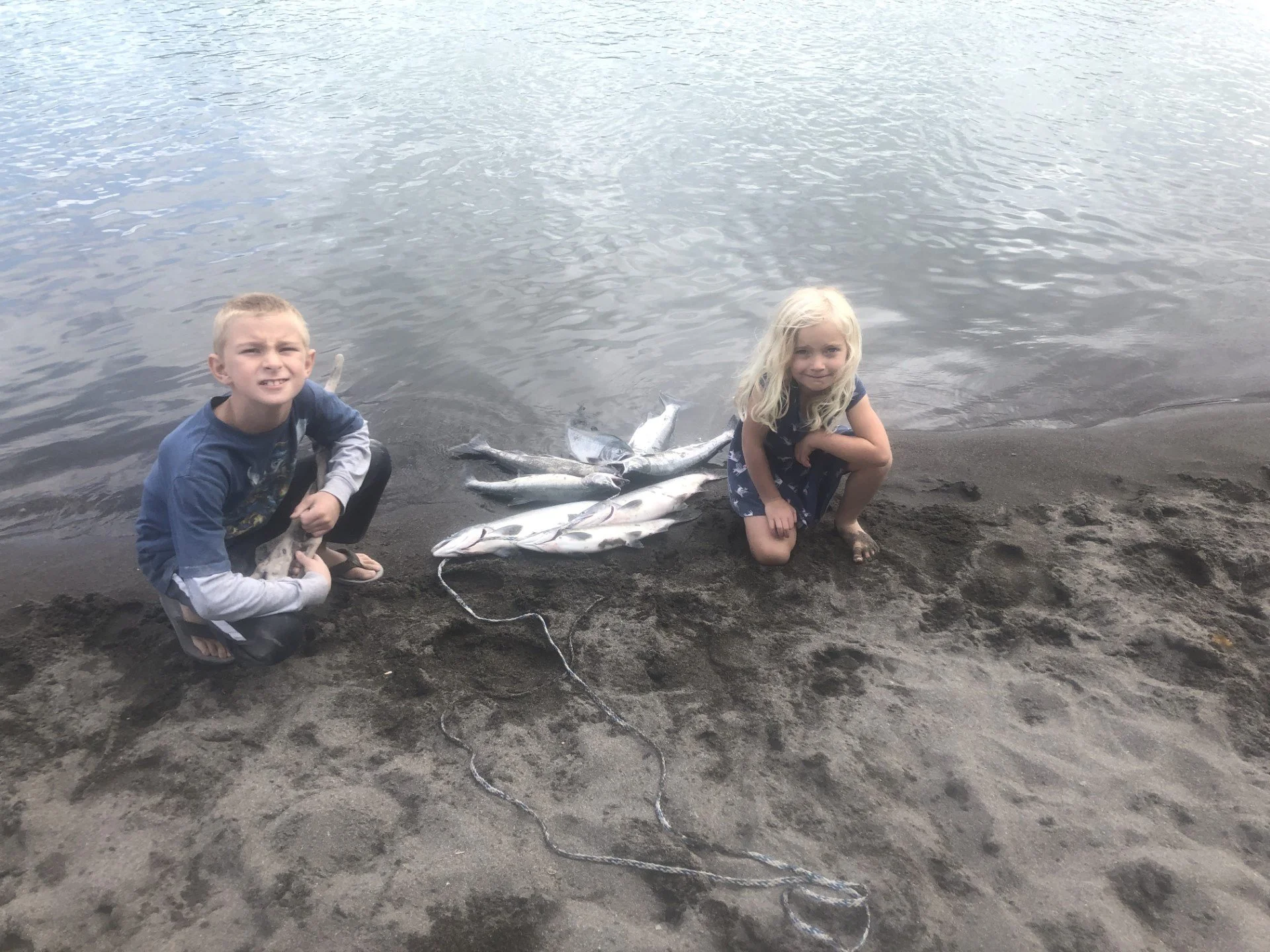 The kids showing off our limit of salmon years ago on the Skagit River.