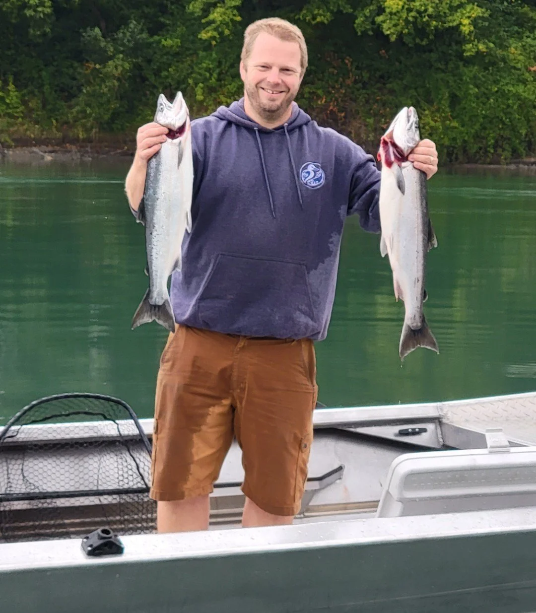 Andrew, the owner of Wyman Guide Service with a pair of nice coho caught on the Skagit River.