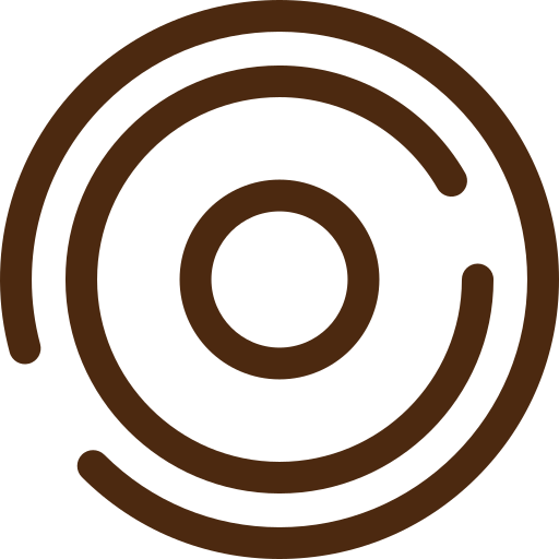 Close-up of a coiled brown wire or cord on a black background.