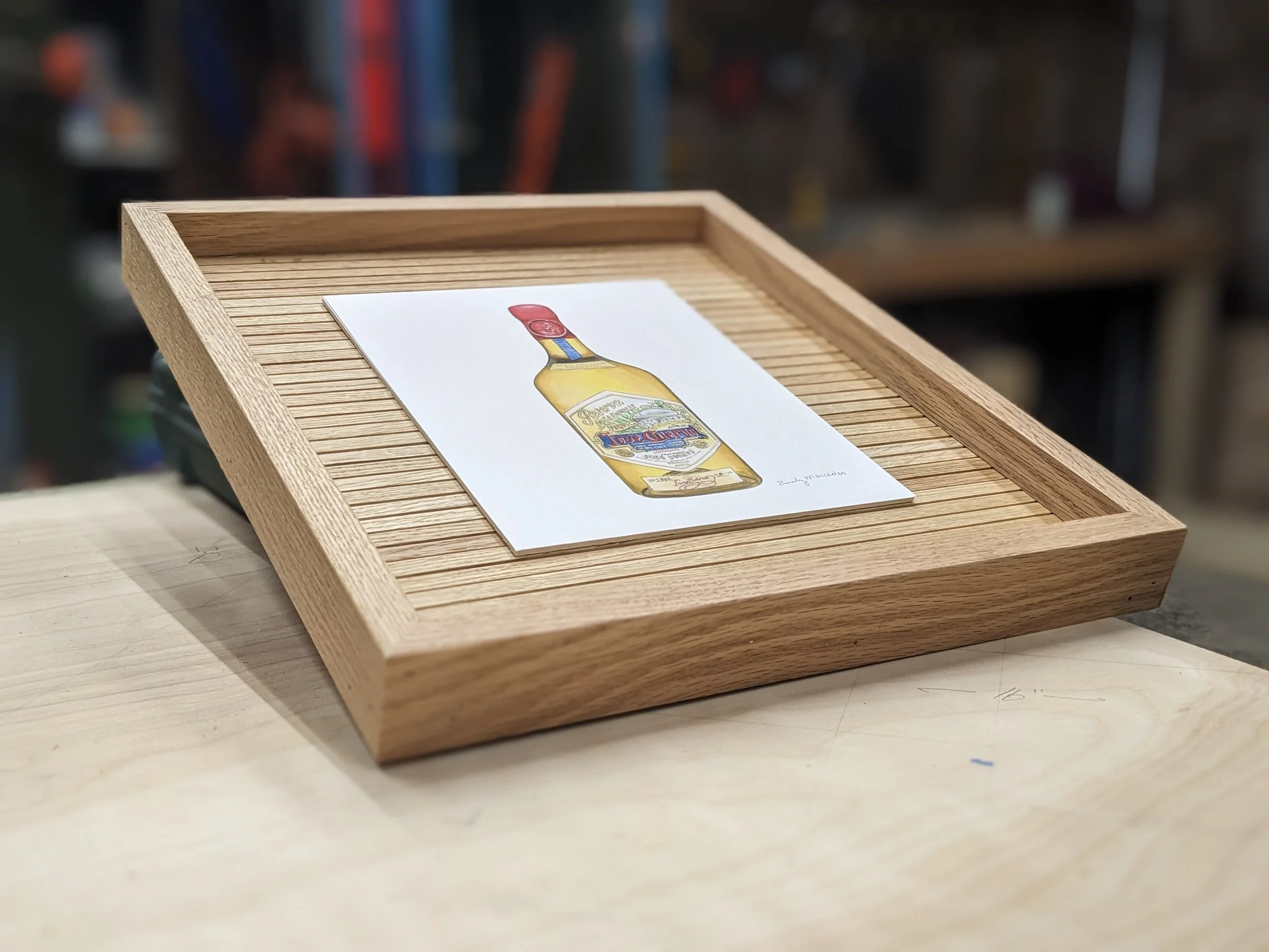 Large Handmade Oak Picture Frame | Custom Made Wood Frame | Natural Artwork Frame

Wood slat art backer to show off tequila bottle painting. 