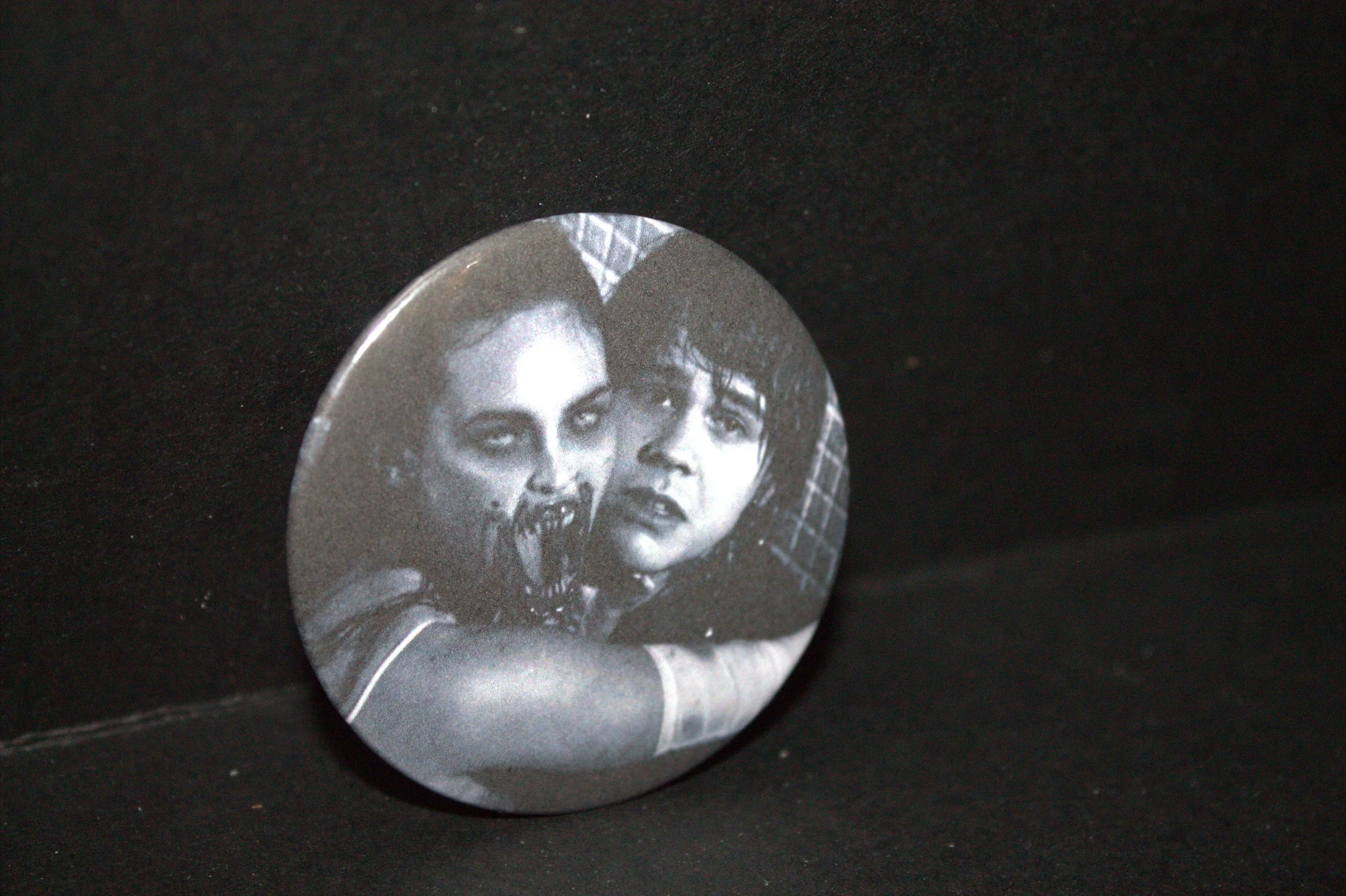 Maneater Button