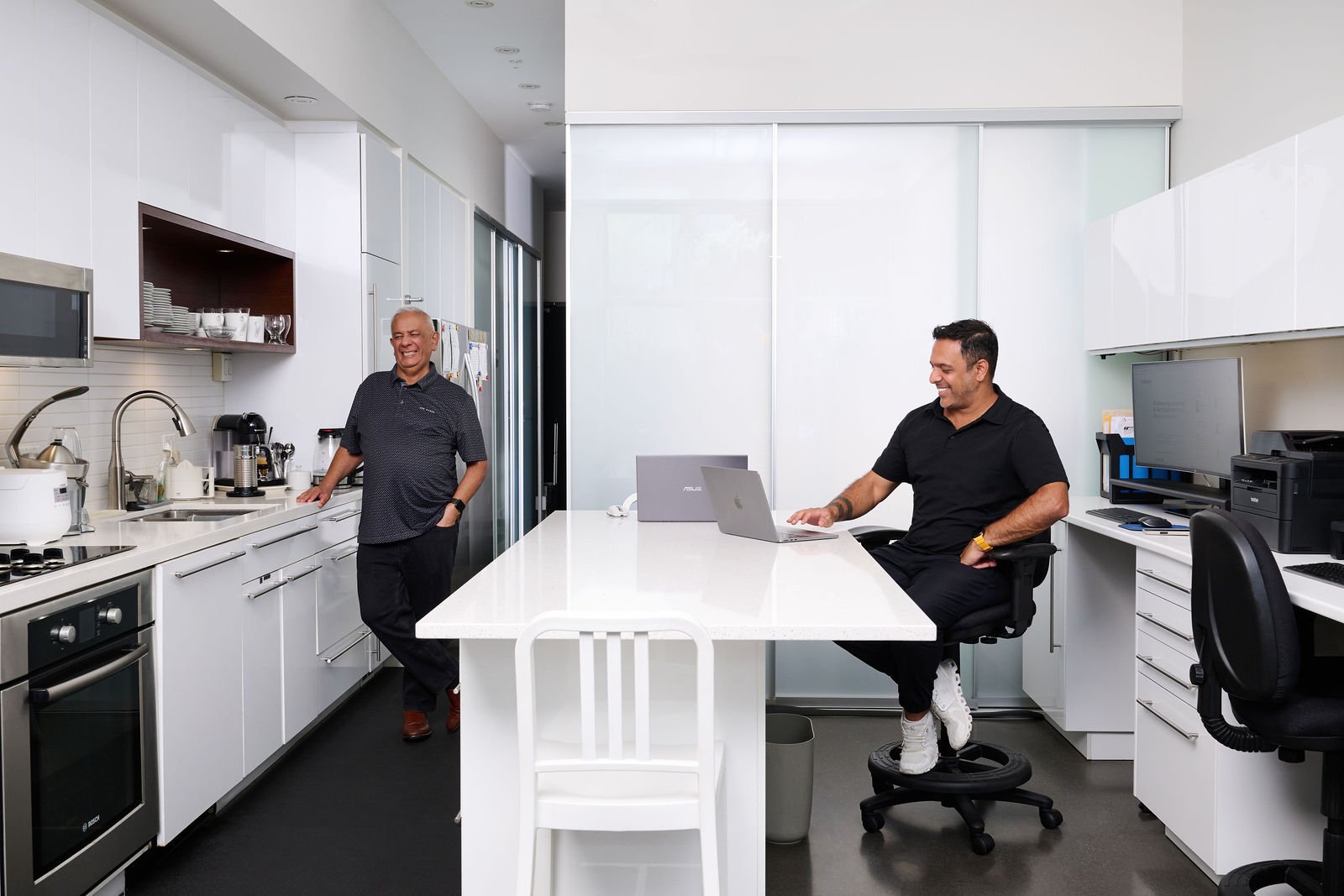 Rahim and Nizar Rayani working together at xBooks in Vancouver