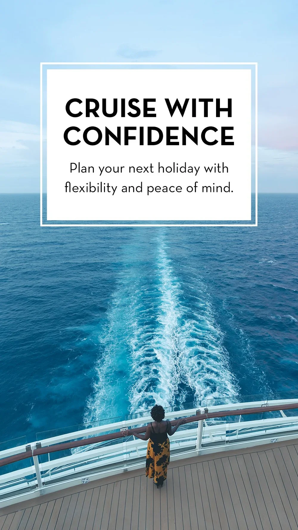 A person standing on the deck of a cruise ship, looking out at the ocean with a clear blue sky above. The person is holding onto the railing and facing away from the camera.