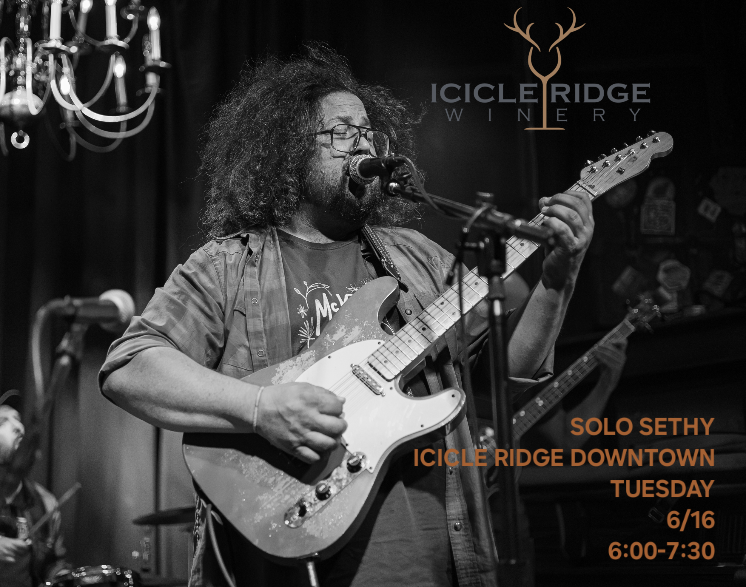 playing an electric guitar and singing into a microphone on stage. The background features a chandelier and a sign with the text 'ICICLE RIDGE WINERY'. There is additional text overlay with event details in orange, including date, time, and location.